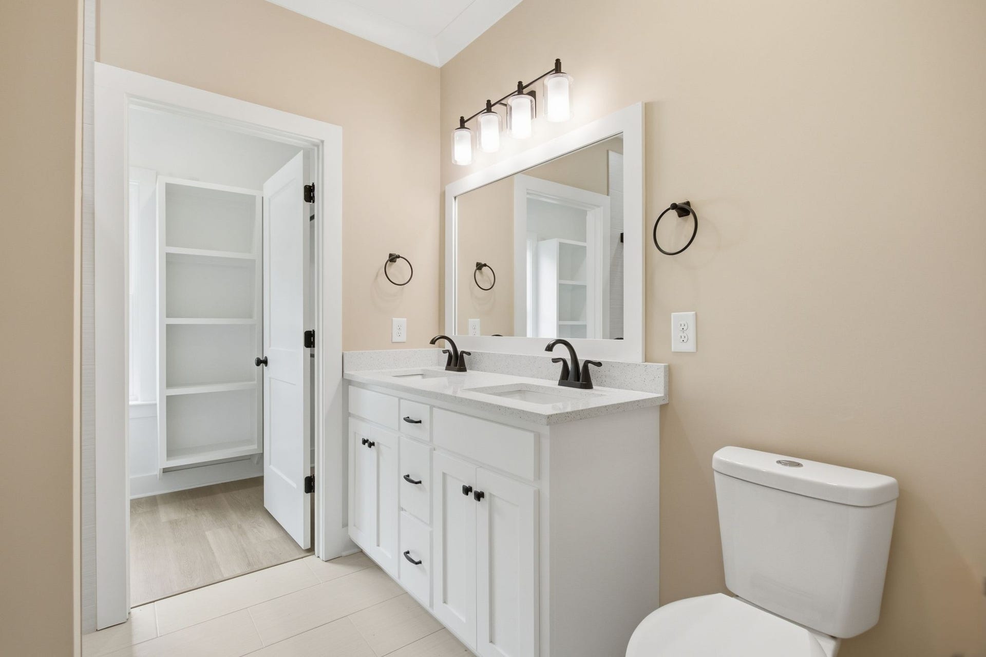 1699 Blue Moon Ln, Columbia, TN 38401 double vanities and tile floors