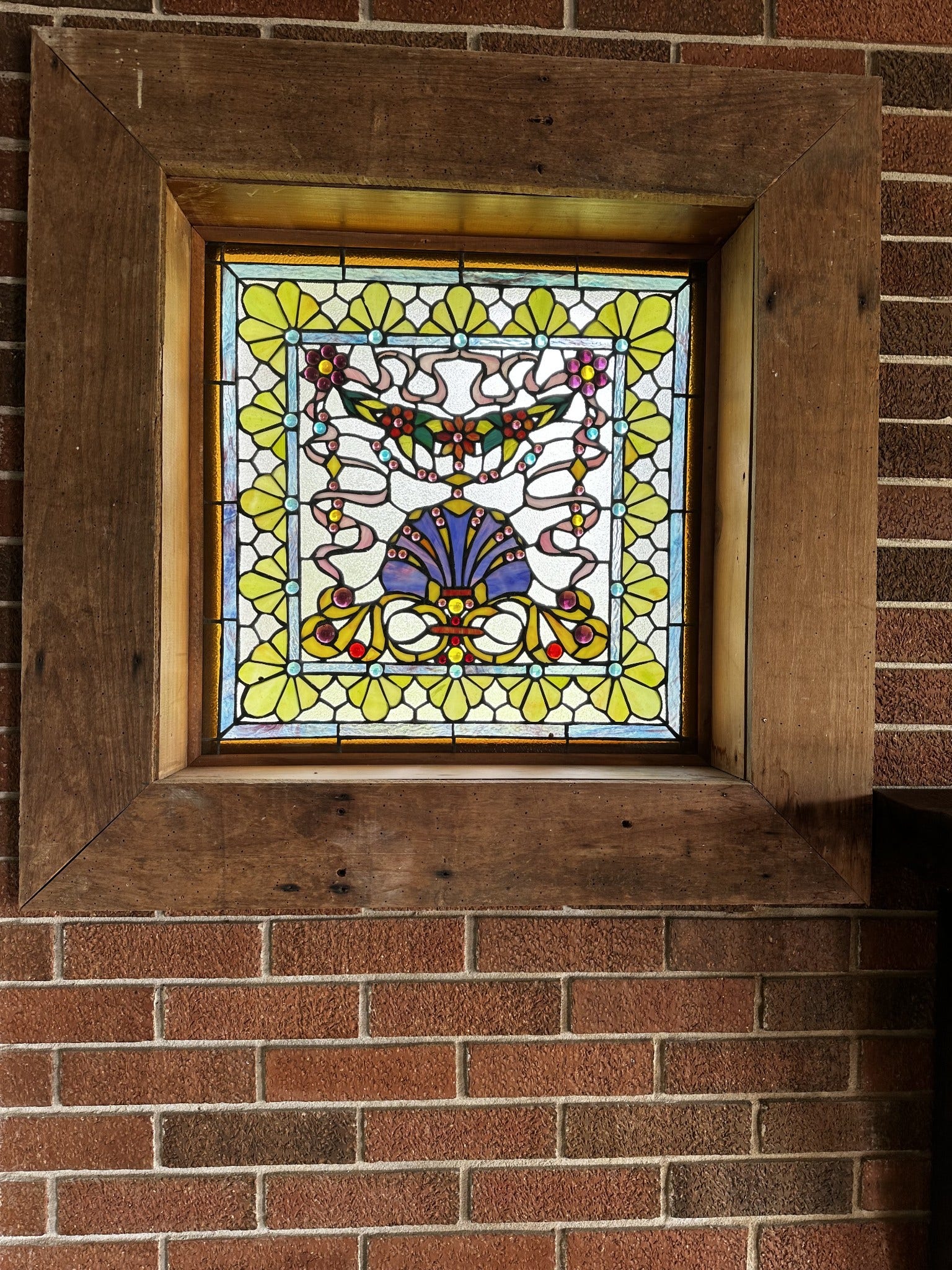 2930 Murfreesboro Hwy, Manchester, TN 37355 Stain glass window with reclaimed barn wood surround