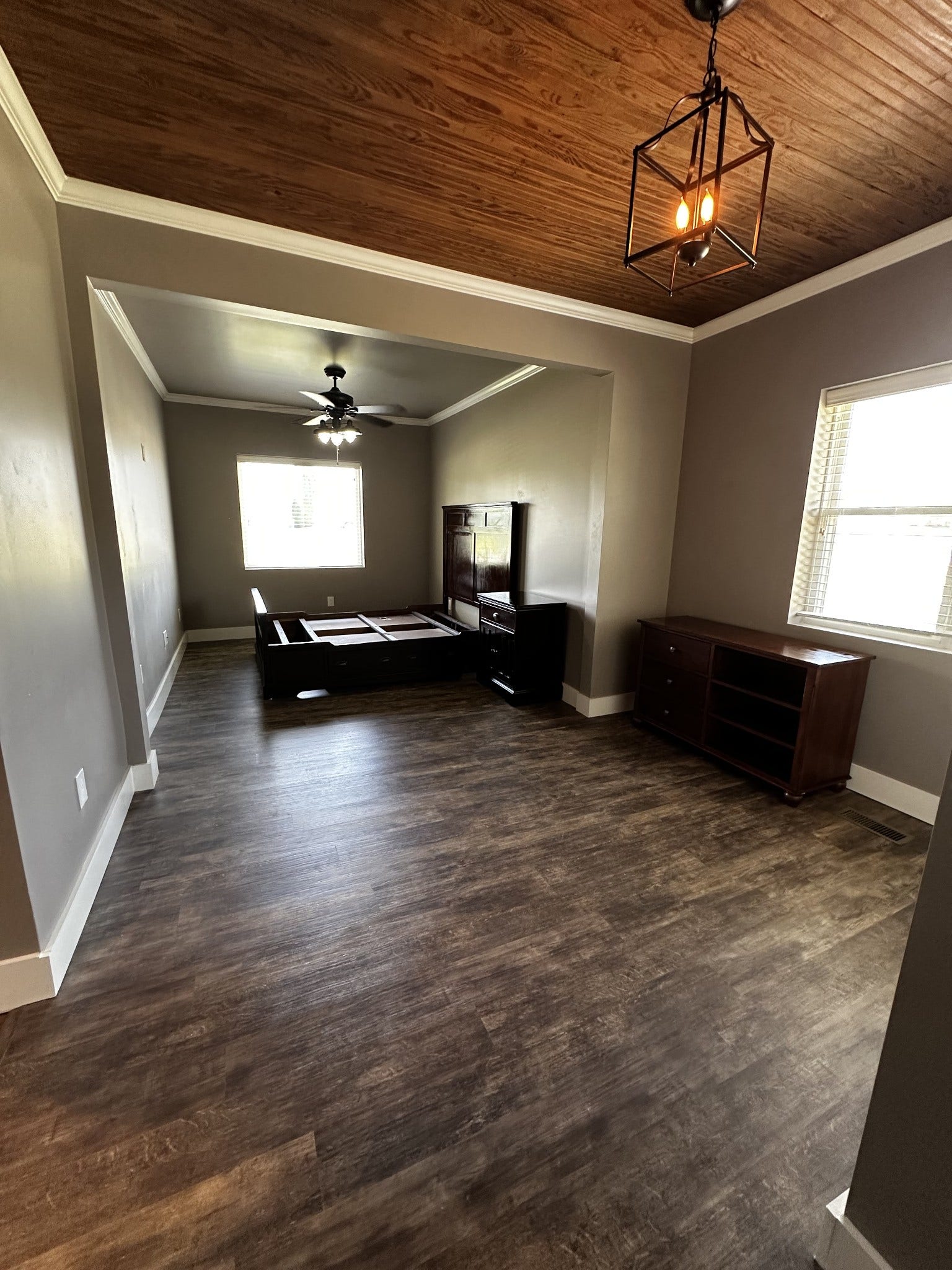 2930 Murfreesboro Hwy, Manchester, TN 37355 Master bedroom with vinyl flooring, large windows, and refinished original bead board ceiling