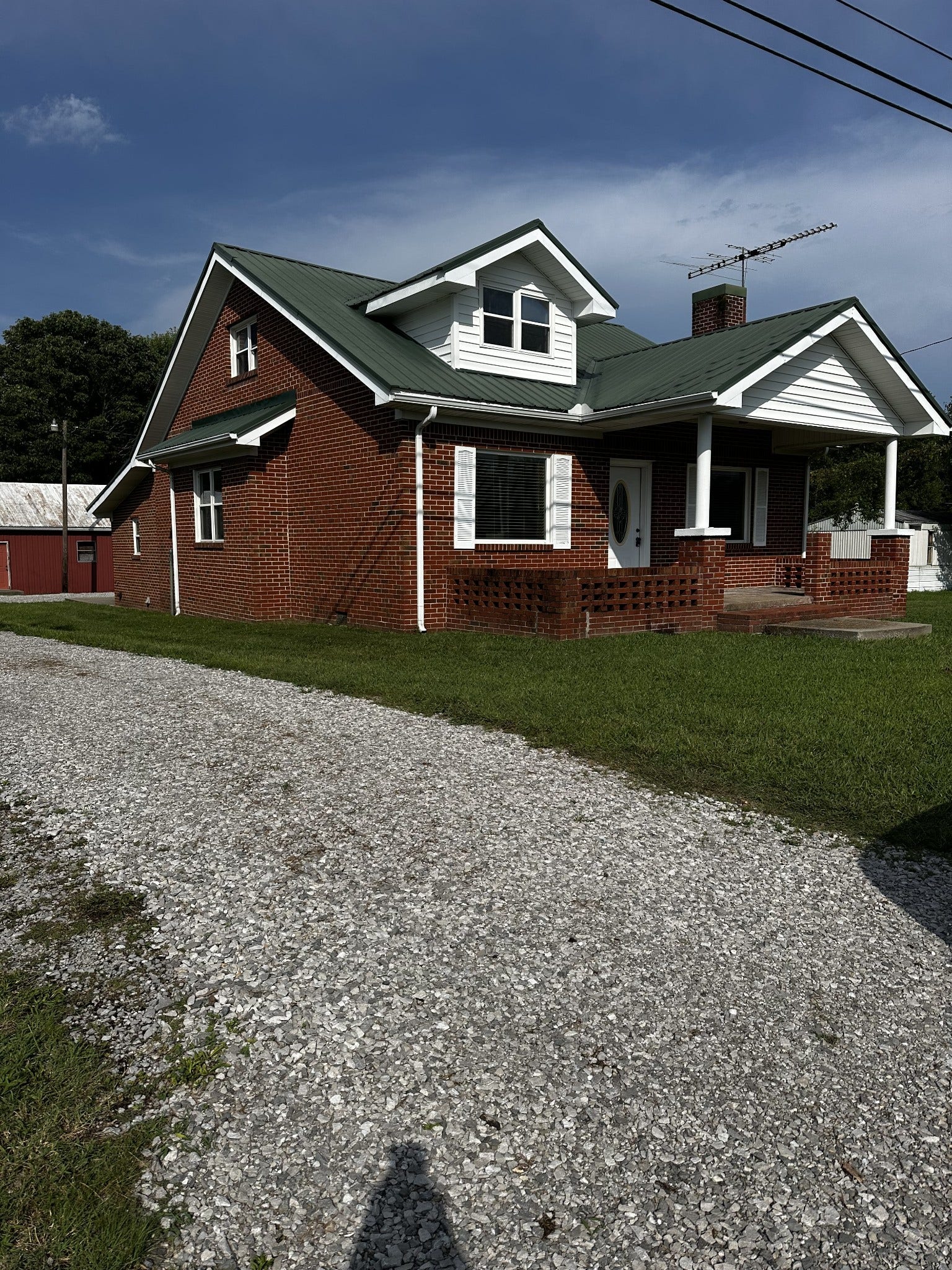 2930 Murfreesboro Hwy, Manchester, TN 37355 Left side of home with new gravel just added driveway