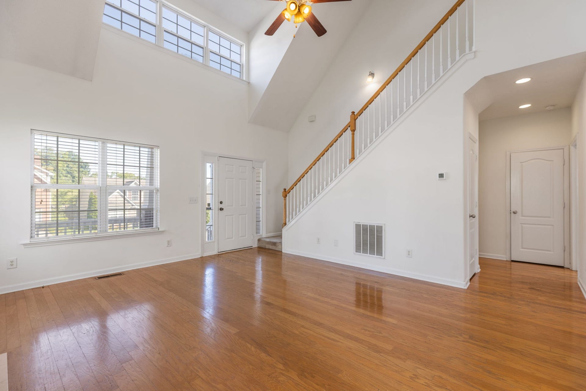 1409 Goodnight Ct, Nashville, TN 37207 Vaulted living room with large windows and tons of natural light!