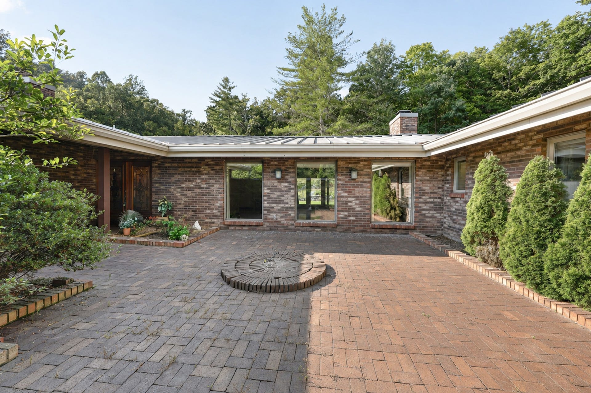 8100 Charlotte Pike, Nashville, TN 37221 3 windows are the living room so imagine watching playtime or your garden