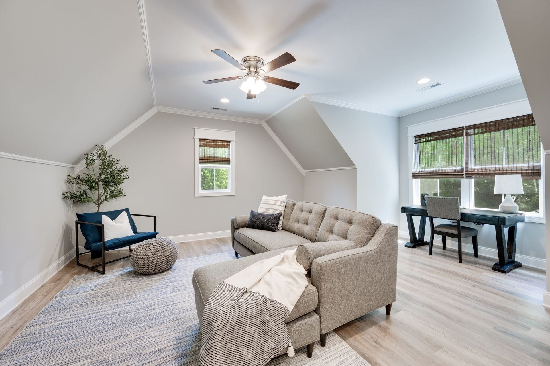 545 Delacy, Fairview, TN 37062 Bonus room over the garage has couch, chair and another desk area.