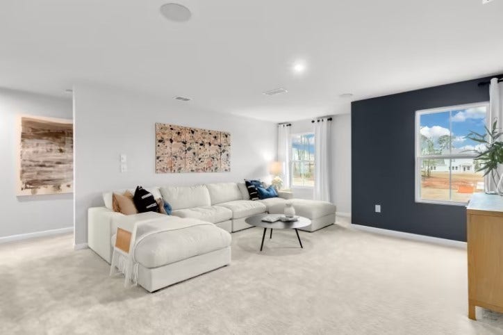 ***Photo is from a previously built Whimbrel model home***

A spacious Loft is included with the Whimbrel home. This is the perfect space for a home theater, game room or secondary living space!