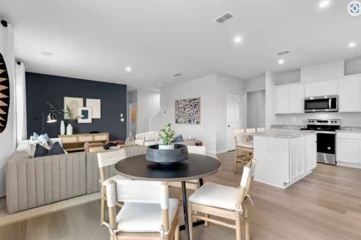 ***Photo is from a previously built Whimbrel model home***

Located off of the Kitchen is the Dining Room, which is designed to comfortably fit a 6 person table.