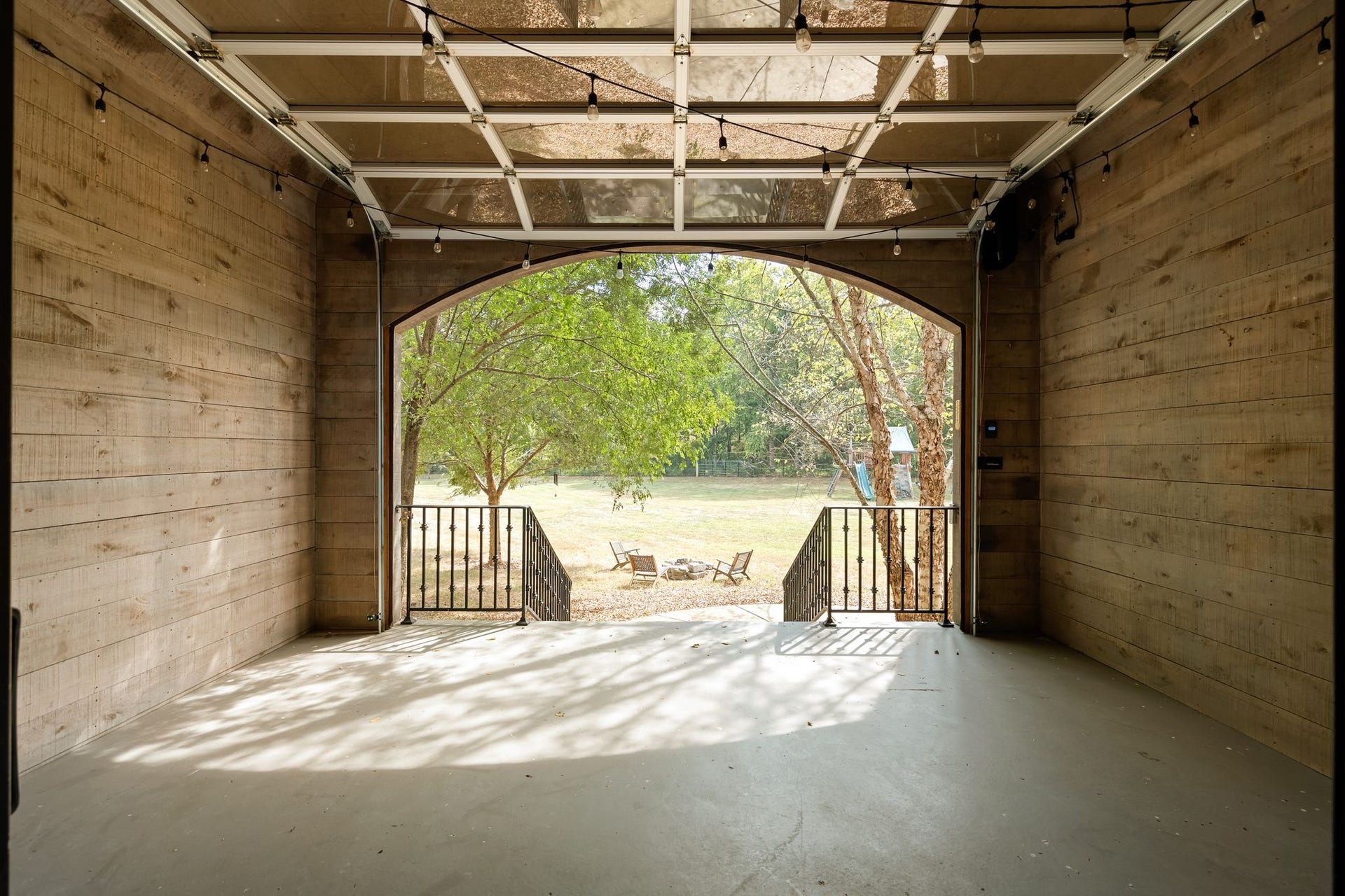 4020 Jessica Ln, Franklin, TN 37064 this is the enclosed porch with glass garage door looking out from living area