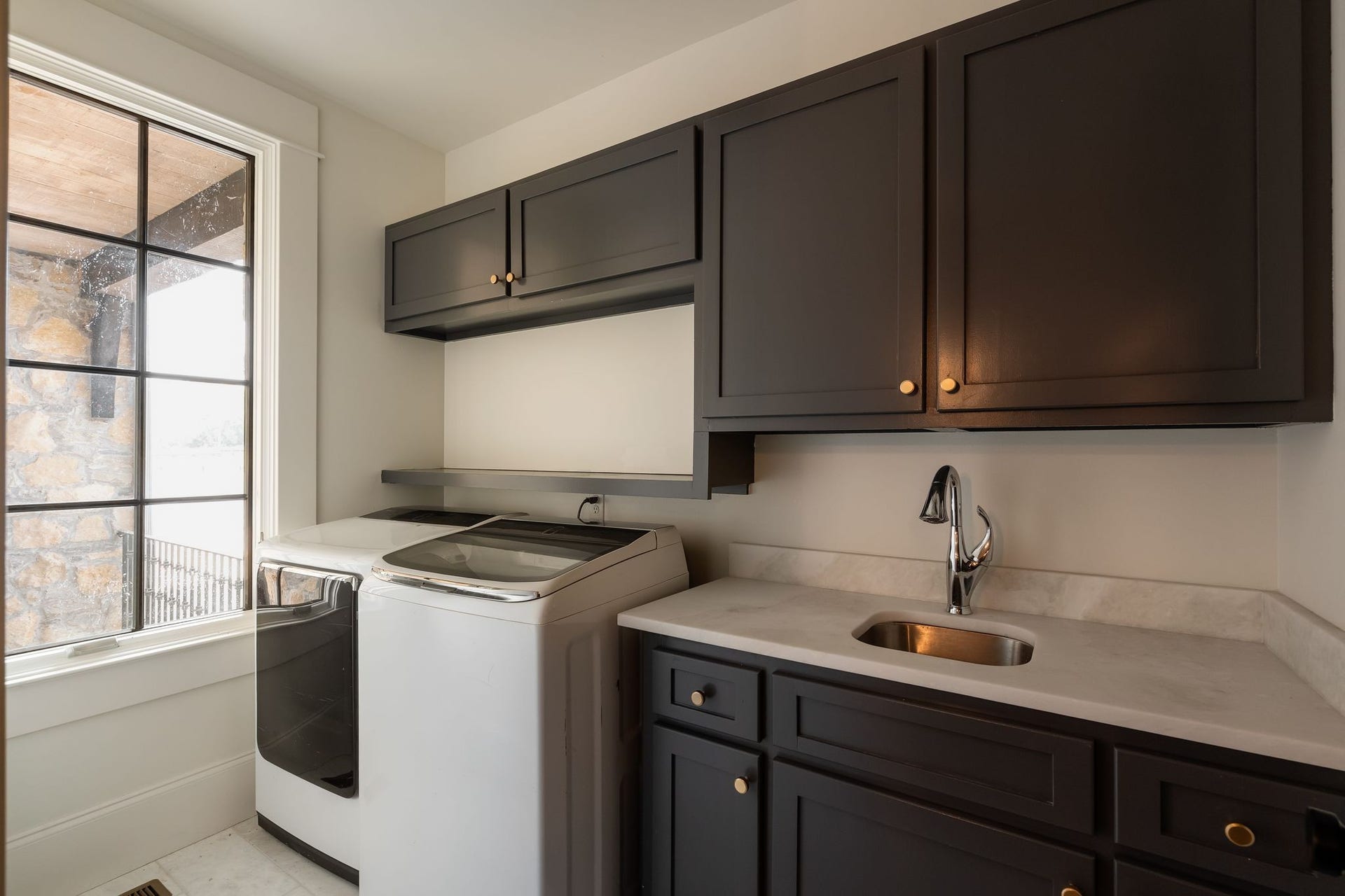 4020 Jessica Ln, Franklin, TN 37064 laundry is right off the hallway from the garage