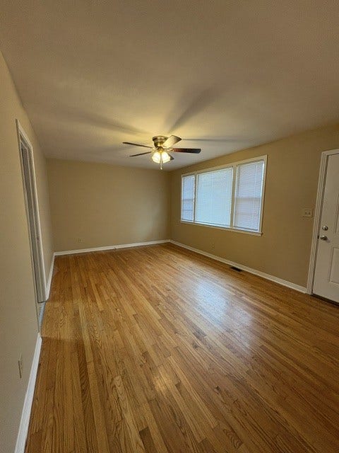 1400 S High St, Columbia, TN 38401 Living room with hardwood flooring and large windows for natural light
The entire interior has been freshly painted.