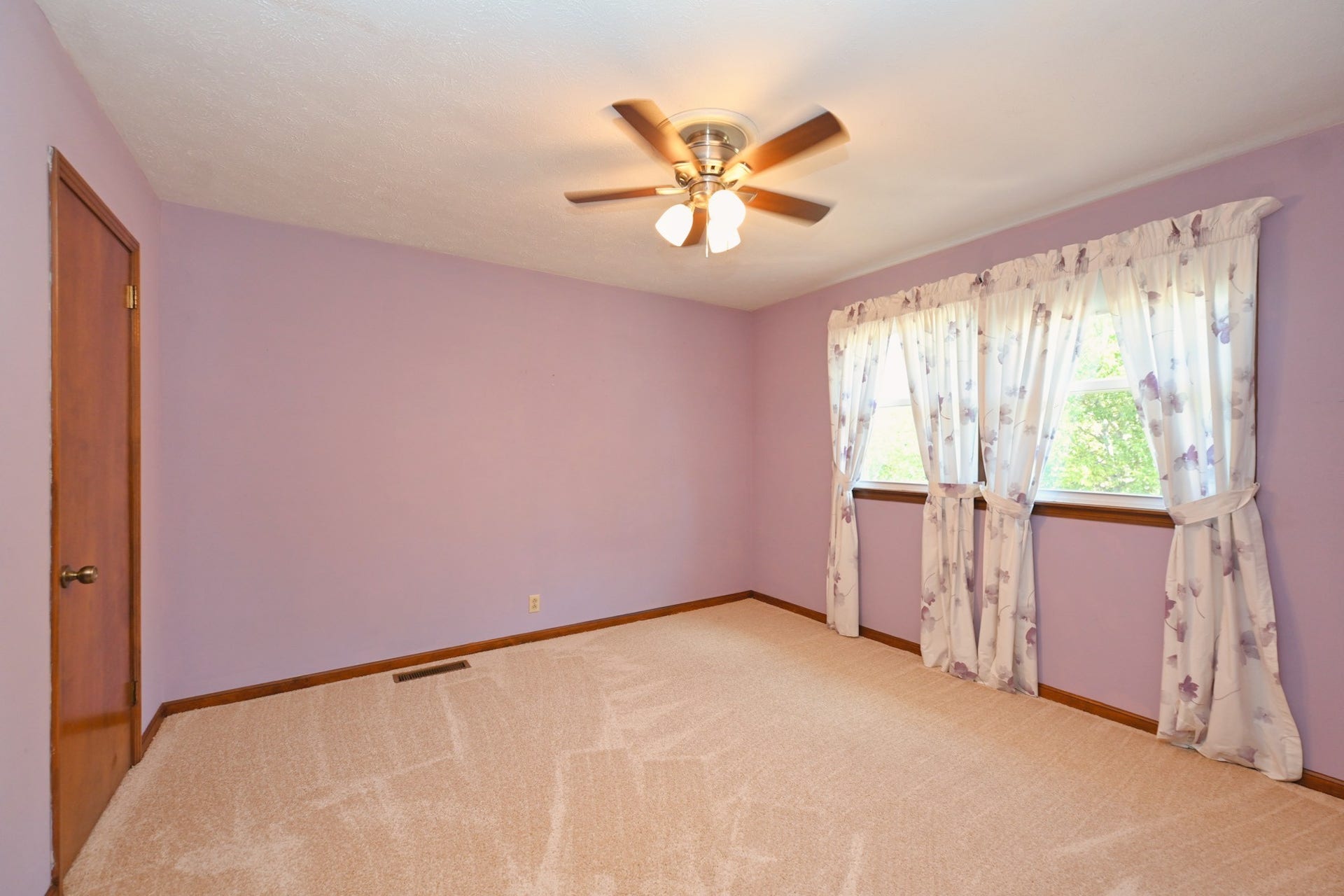upstairs bedrooms feature double windows and closets!