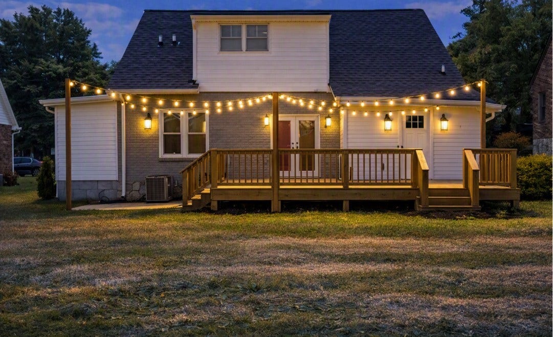 Plenty of room for entertainment.  Virtually staged picture but patio lights have been added.