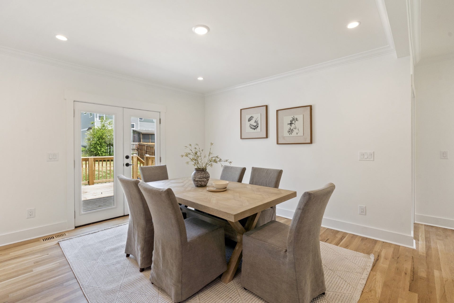 Dining area exits/entry to large back deck, perfect for grilling out.