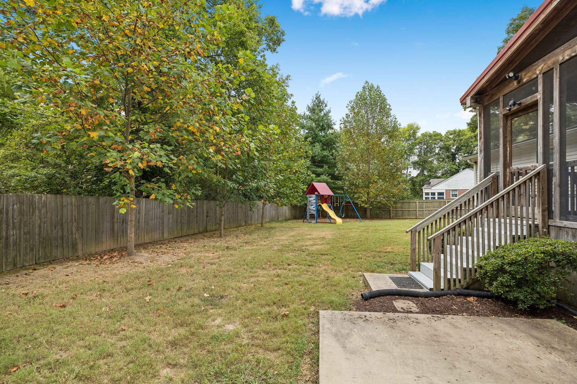 Outside, theres room to slow down. A private fenced yard, mature trees, and plenty of grassy space create a backyard that feels like a little escape of its own.
