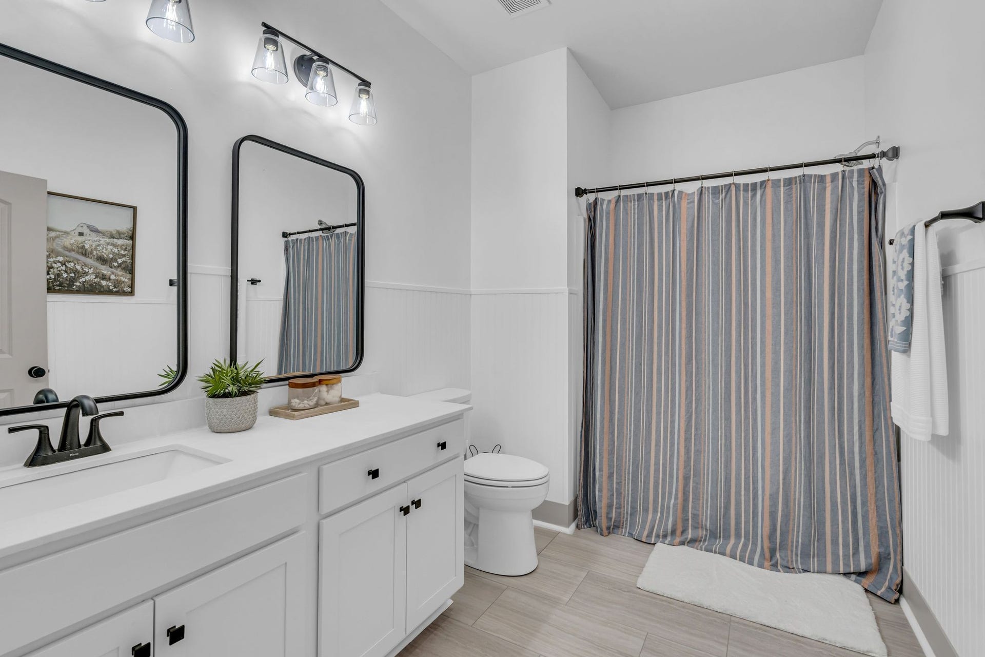 The second bathroom is huge. There's plenty of counter space and a tub/shower combo.