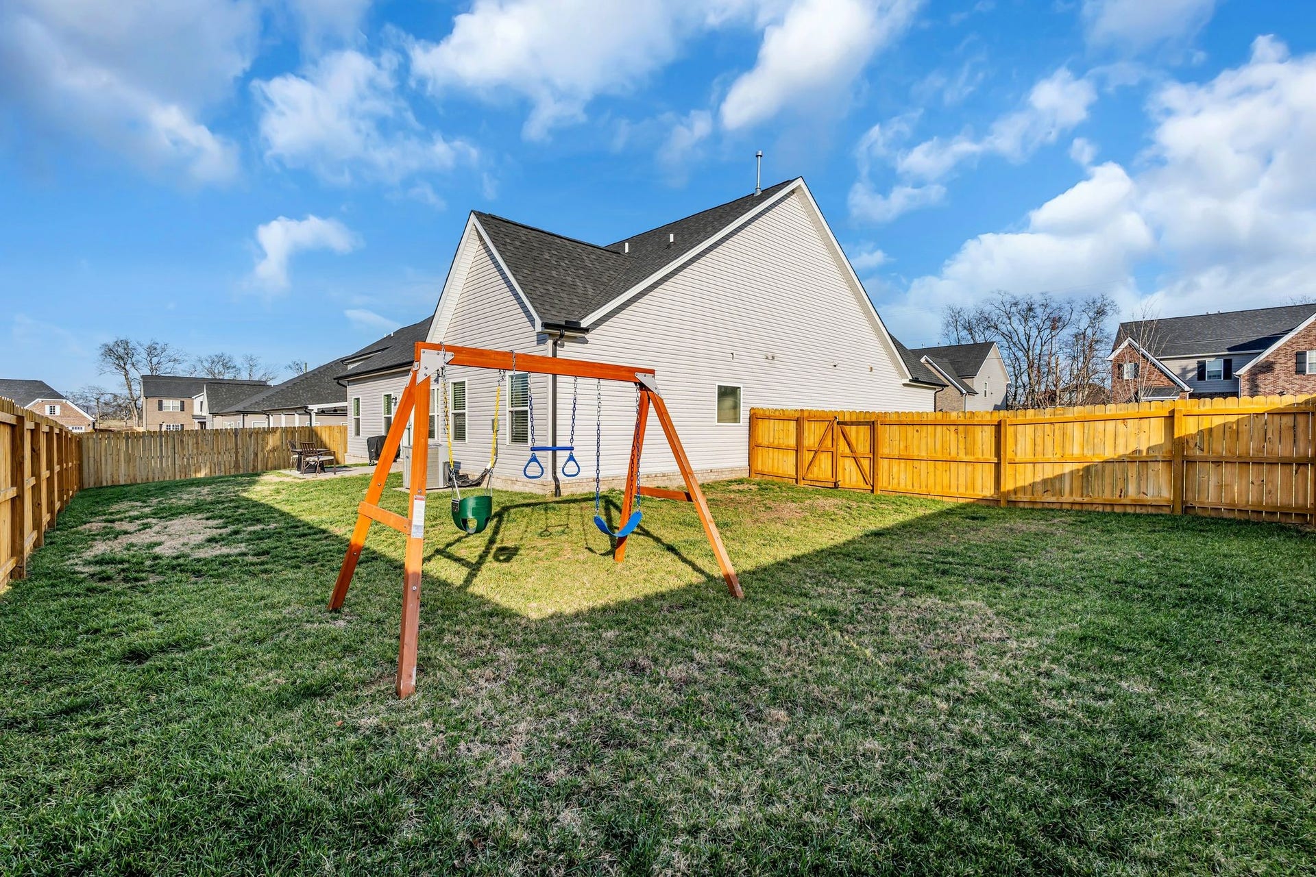 The side yard offers lots of extra room for play, gardening, etc.