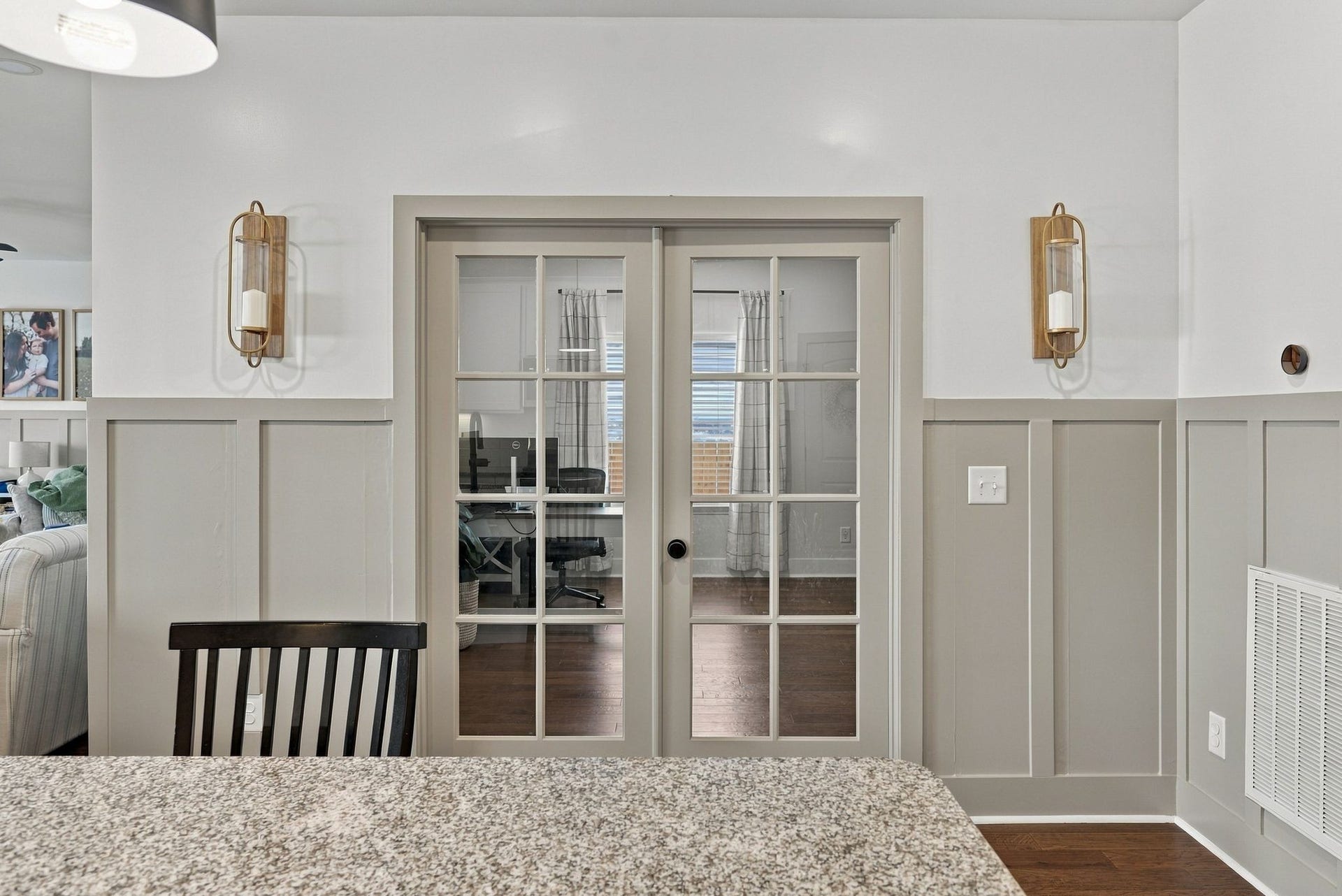 A recent update are these lovely french doors for the home office/bonus area. Accented with the same wainscoting wall feature.