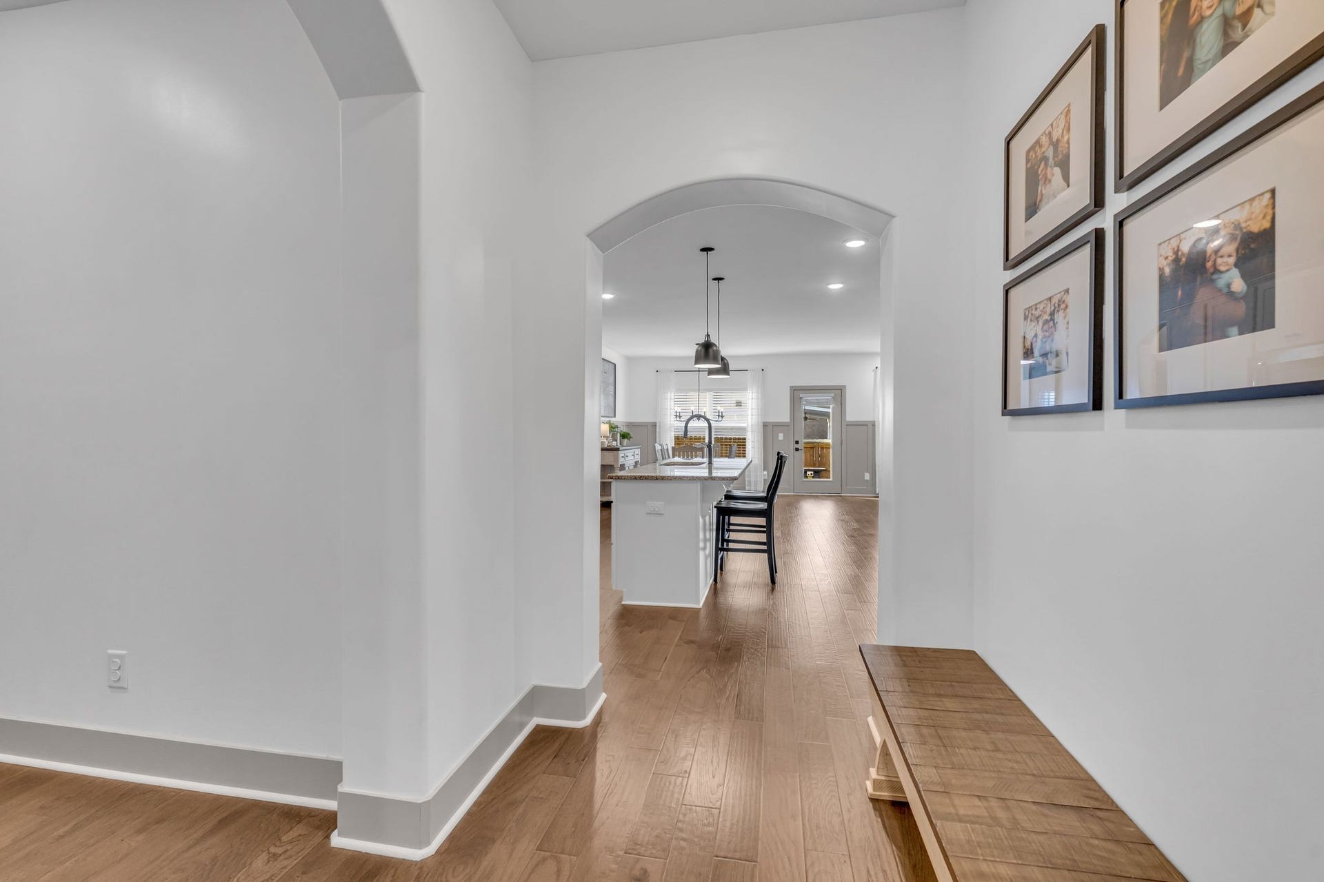 To the left is the garage entry and laundry (which leads to the primary closet).