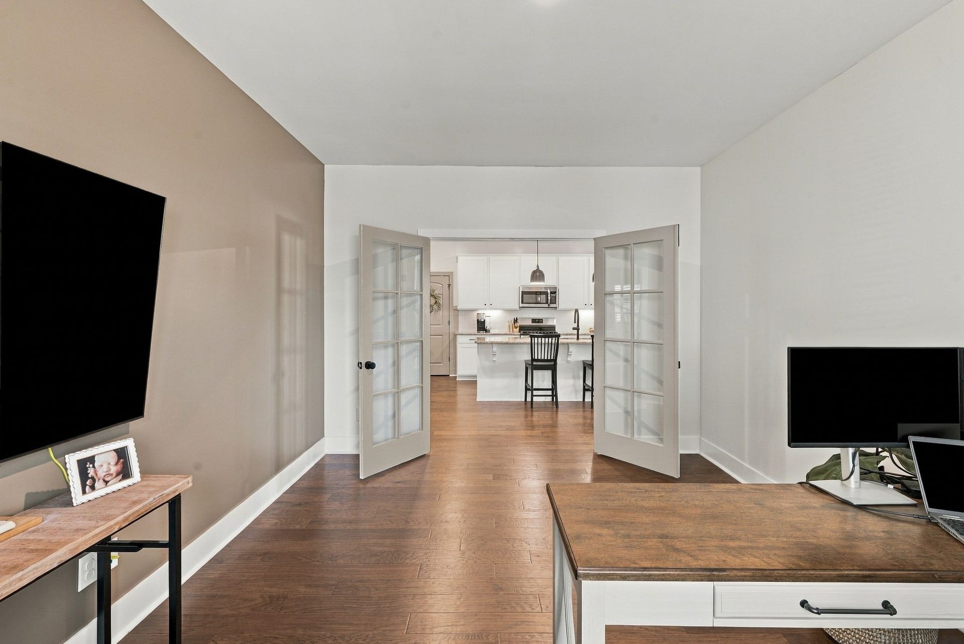 The newly added french doors give the office more privacy when needed.