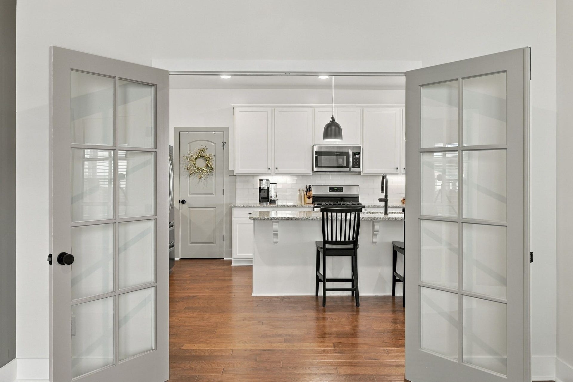 The french doors are a lovely upgrade to this space.