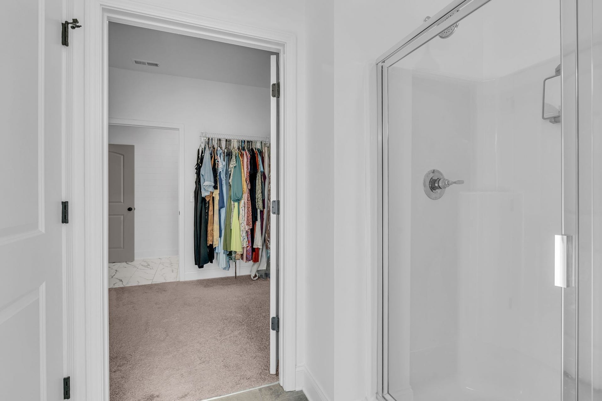There's a really spacious walk in closet that also opens to the laundry room.