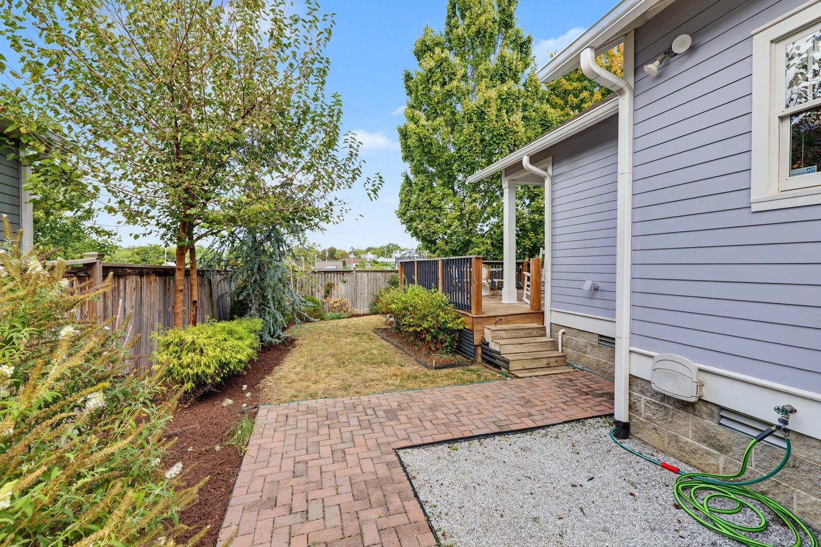 1415 Fatherland St, Nashville, TN 37206 brick pavers create a generous pathway in the side yard
