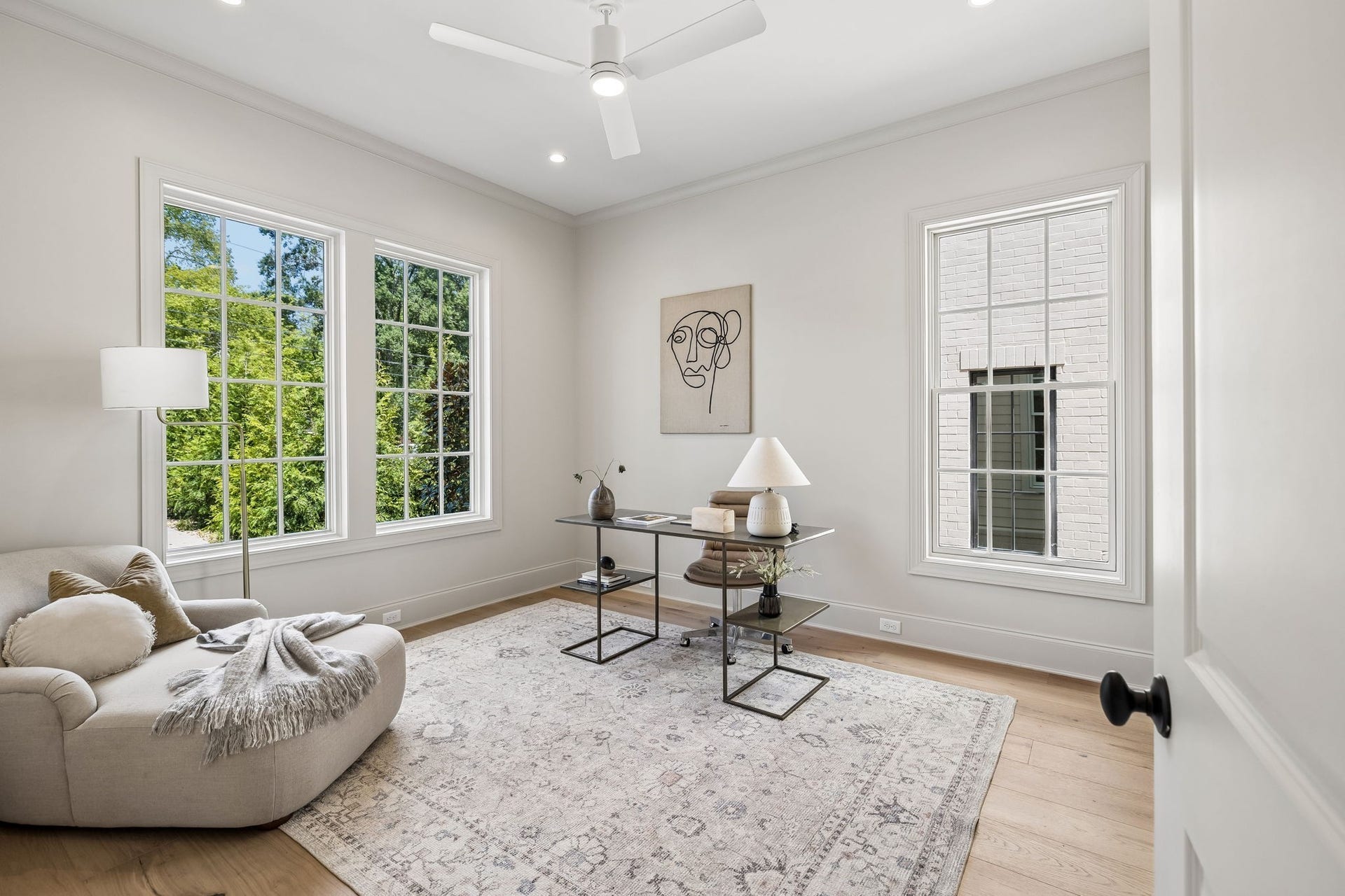 1133 Maplehurst Ln, Nashville, TN 37204 Private main-level bedroom, currently staged as an office, offers wonderful flexibility for guests, work-from-home space, or multigenerational living