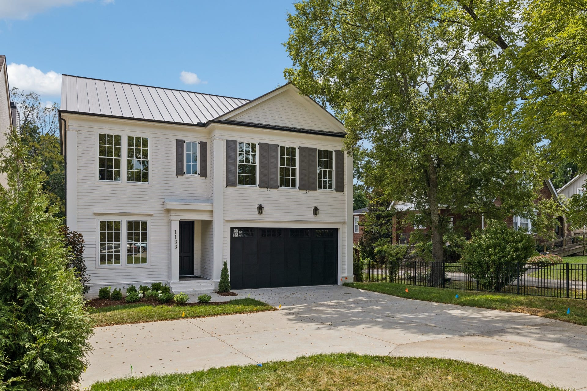 1133 Maplehurst Ln, Nashville, TN 37204 The unusually wide HPR lot provides a greater sense of space and privacy than typically found in newer luxury construction.