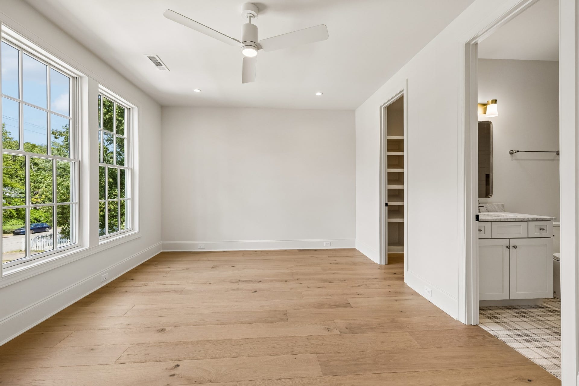 1133 Maplehurst Ln, Nashville, TN 37204 Spacious Bedroom 3 offers its own private bath and generous walk-in closet. The ensuite bath blends modern finishes with classic, timeless design for a polished and comfortable retreat.