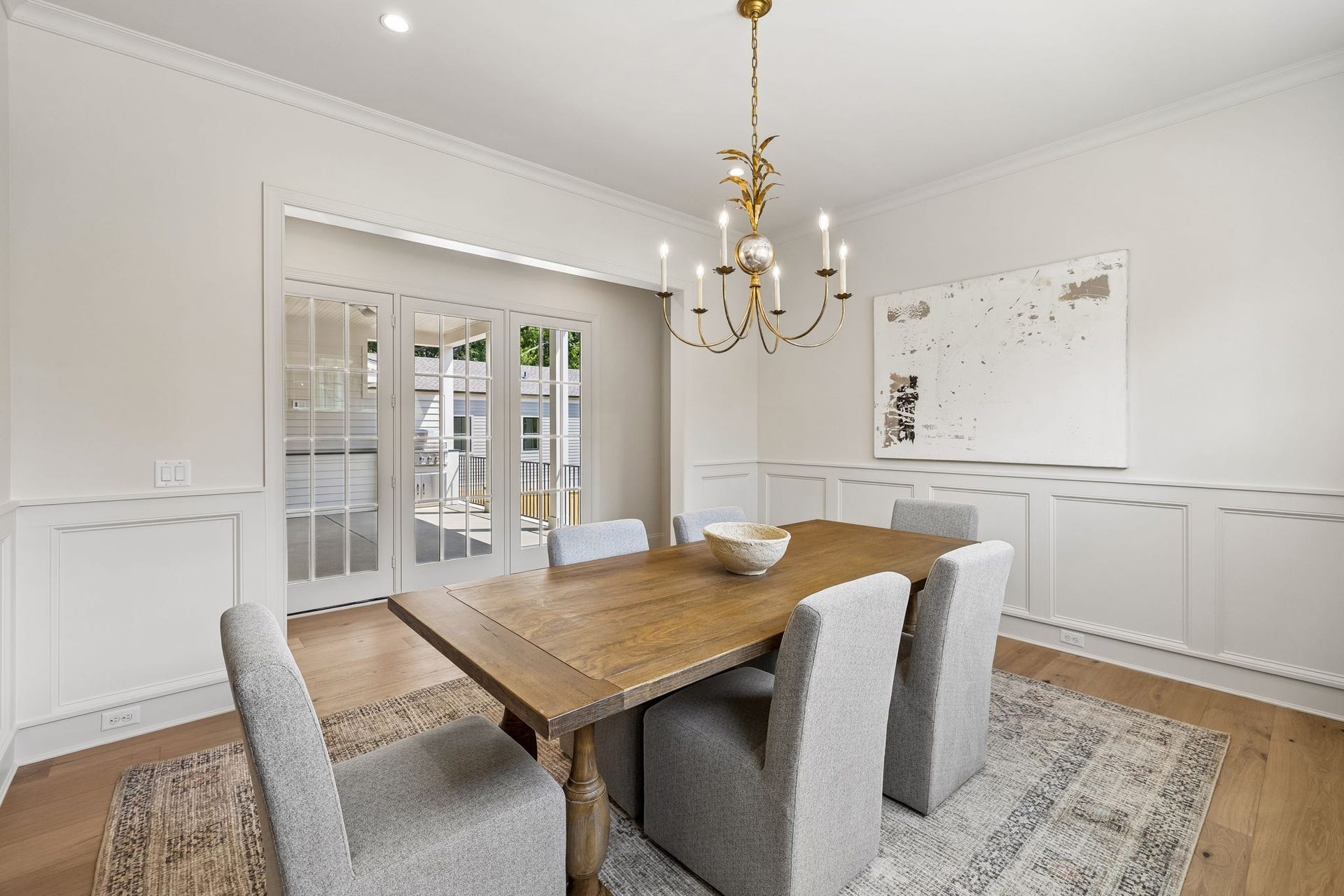 1133 Maplehurst Ln, Nashville, TN 37204 Another view of the dining room highlights the beautiful millwork and French doors providing a seamless connection to the outdoor living area.