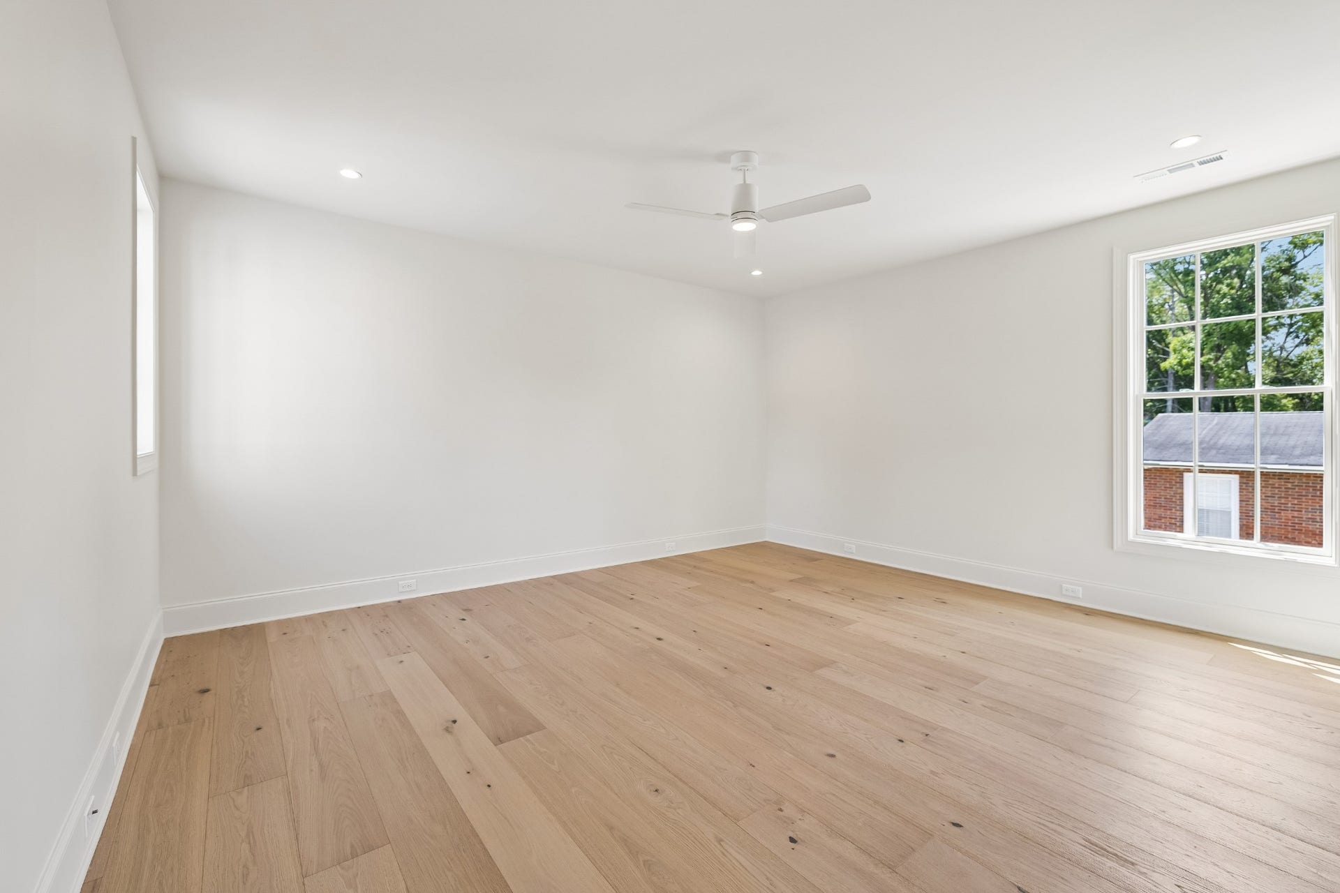 1133 Maplehurst Ln, Nashville, TN 37204 Tucked away down its own hallway, Bedroom 5 offers exceptional privacyideal for guests, older children, or extended stays. The spacious suite includes a private full bath with double vanity and glass-enclosed shower, plus a large custom walk-in clos