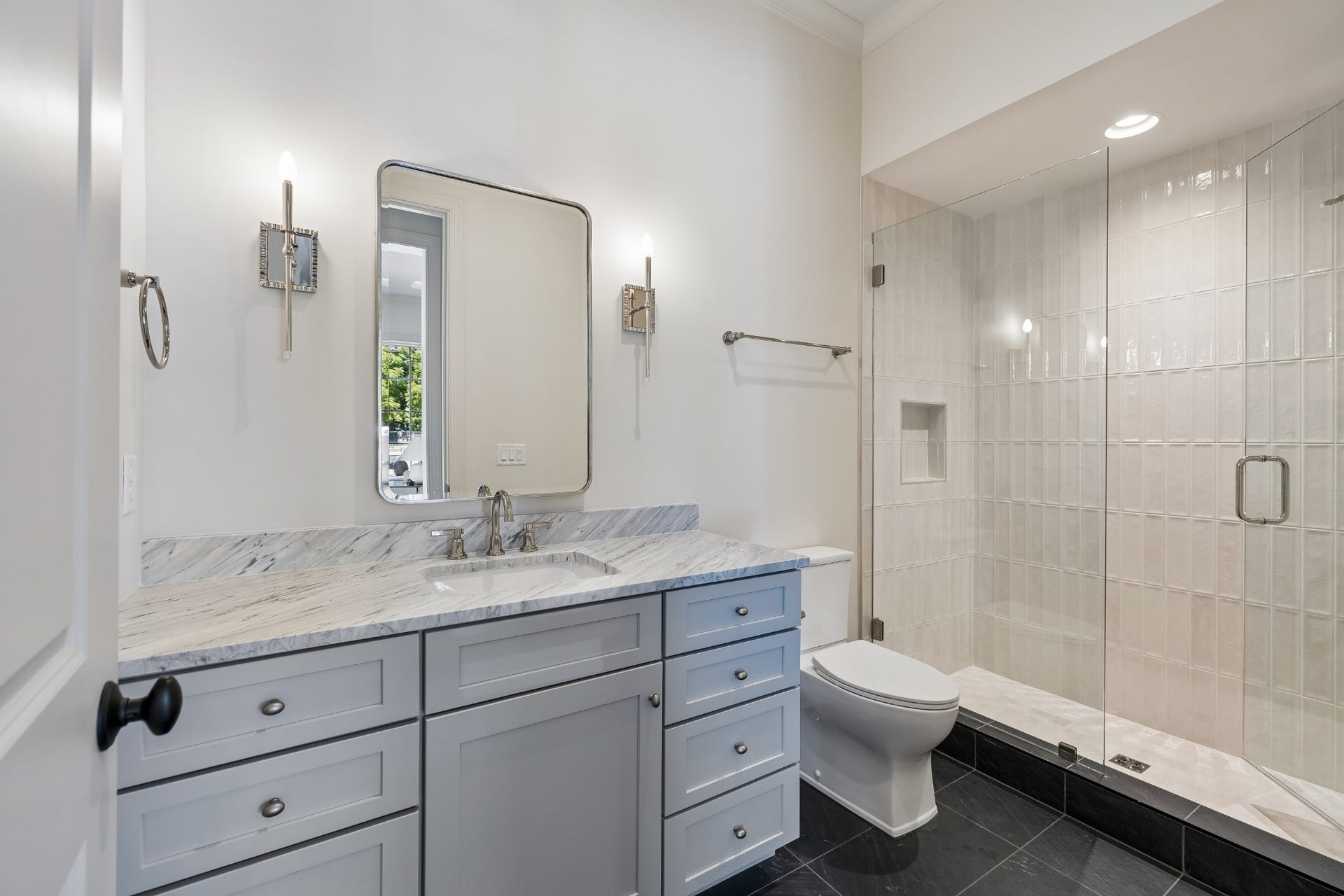 1133 Maplehurst Ln, Nashville, TN 37204 Bedroom 4 is equally well-appointed with a large walk-in closet and private ensuite bath featuring a sophisticated modern-classic designgiving every bedroom the feel of its own private suite.