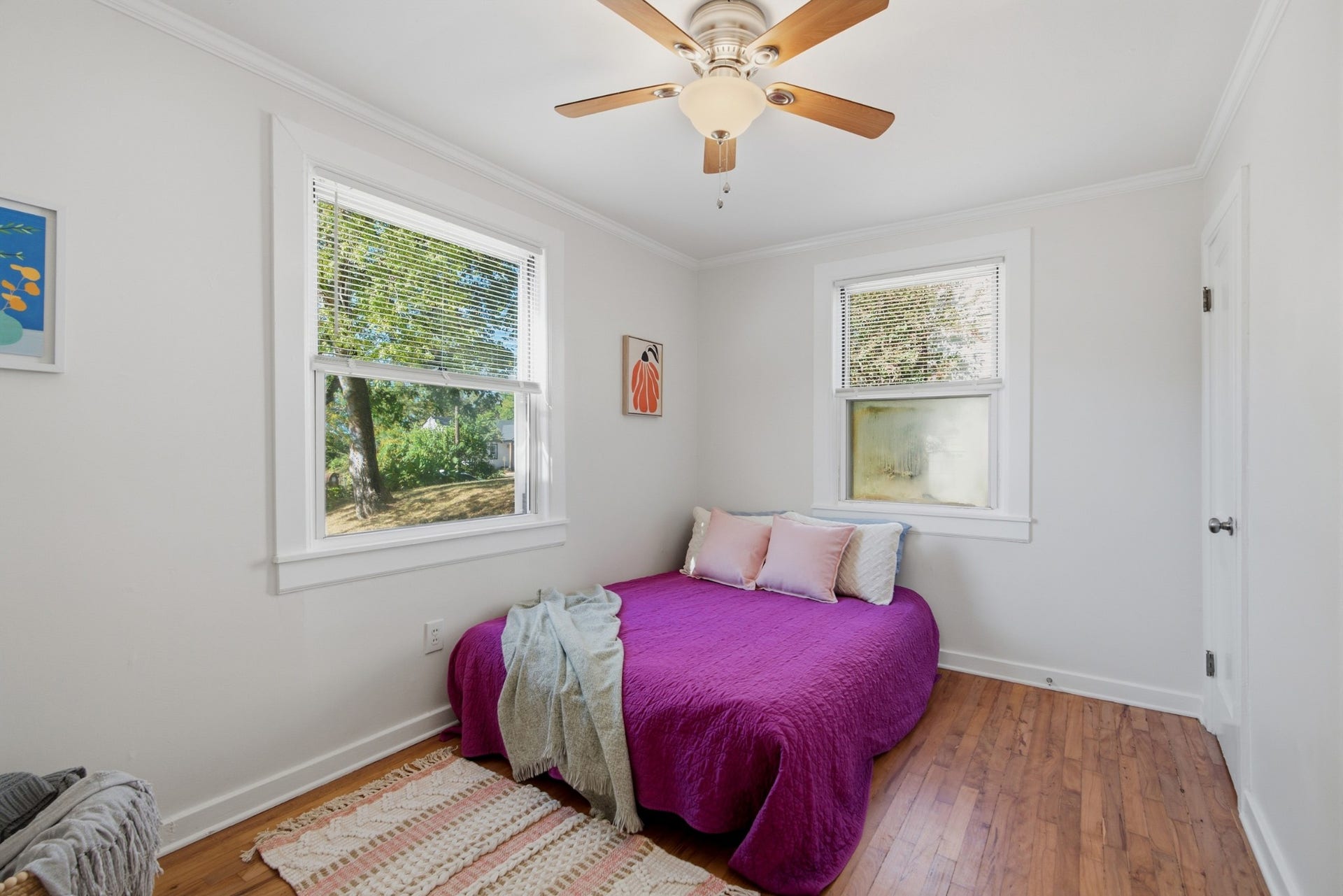 631 Blackstone Ave, Madison, TN 37115 Primary bedroom features hardwood floors, natural light, and fresh paint.
