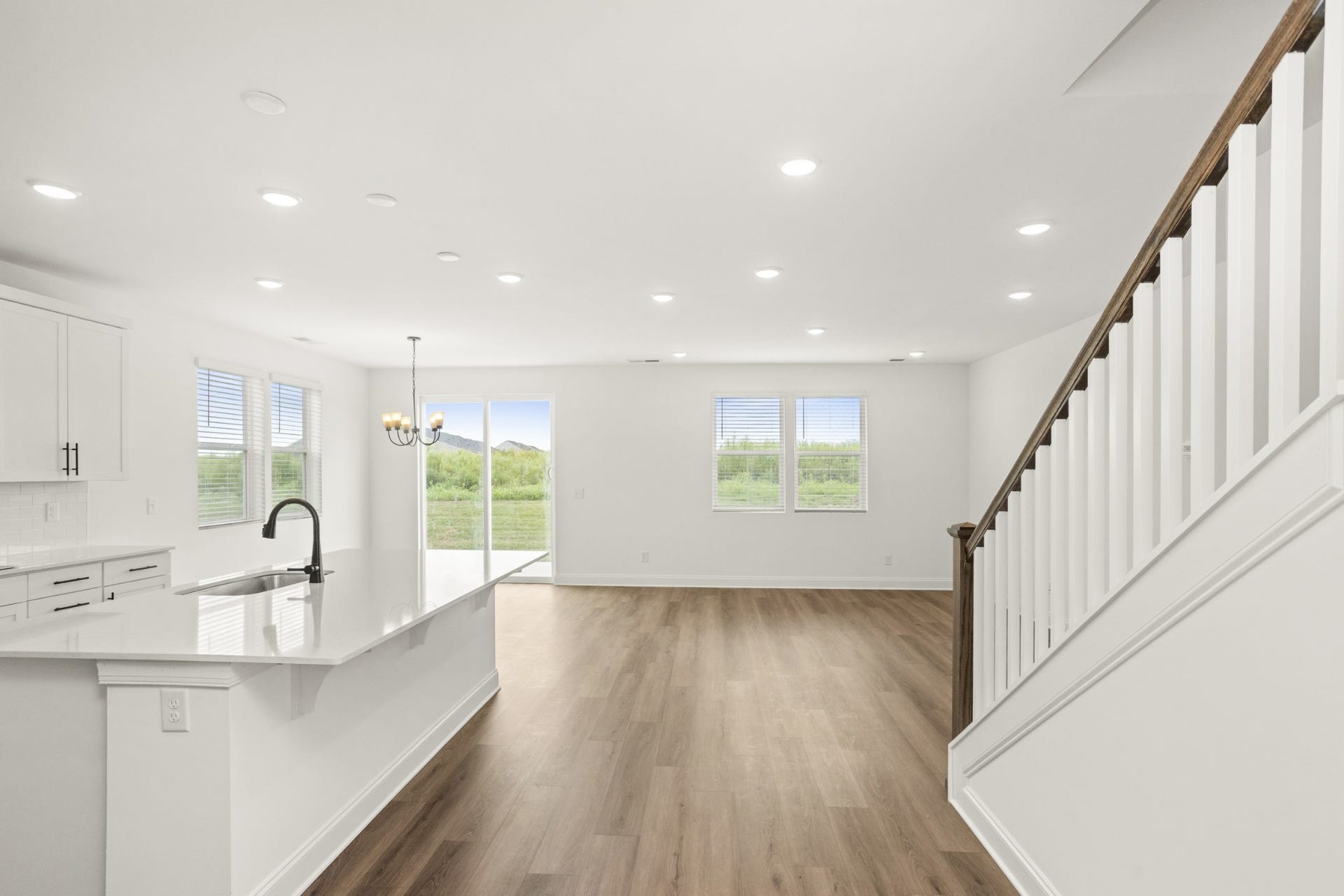 2319 Williamsport Landing, Columbia, TN 38401 View from the hall way from the office/front entry, looking towards the 1st floor family room and dining area with the kitchen on the left