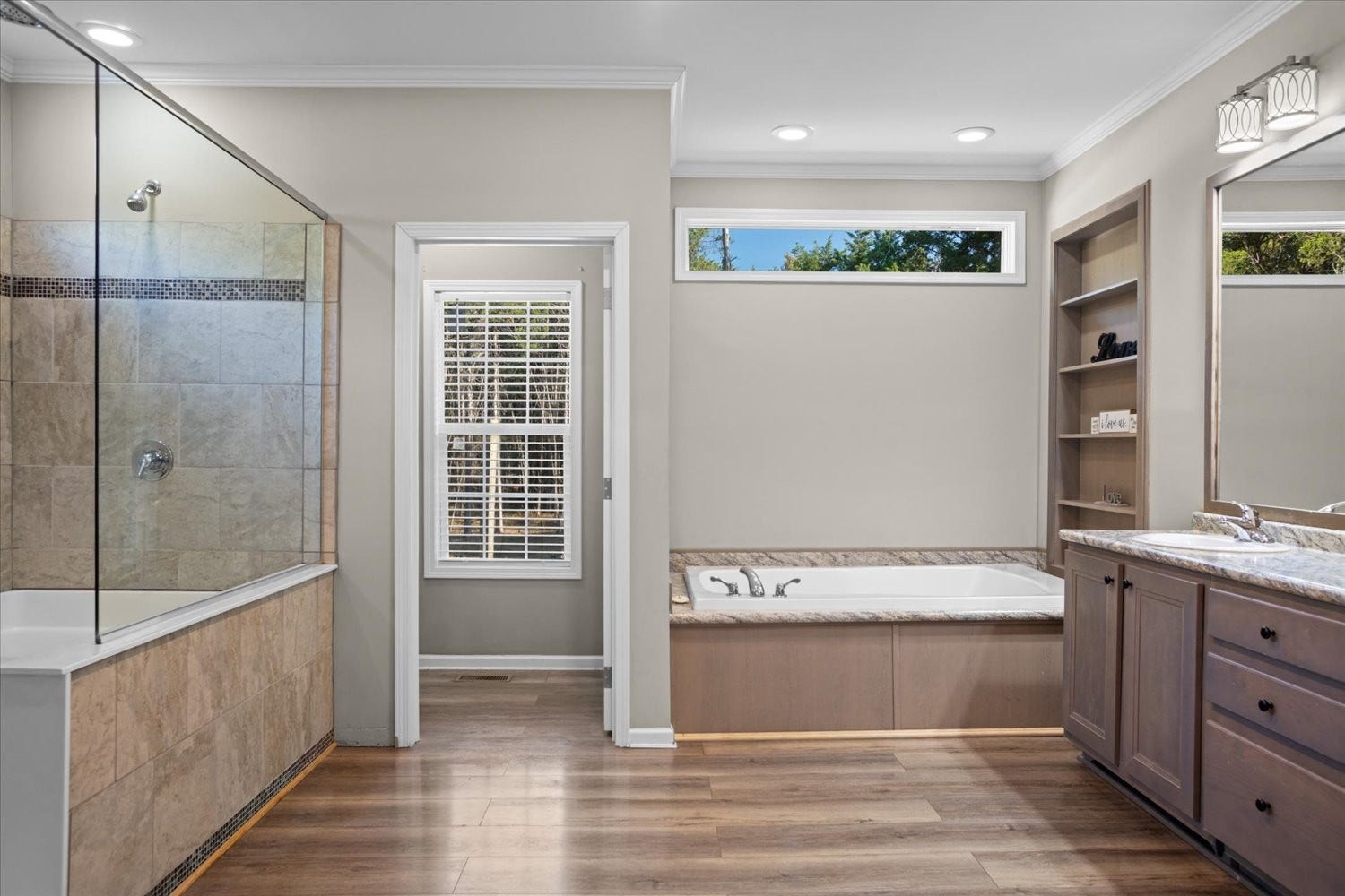 Walk-in shower, tub, double vanities and private toilet