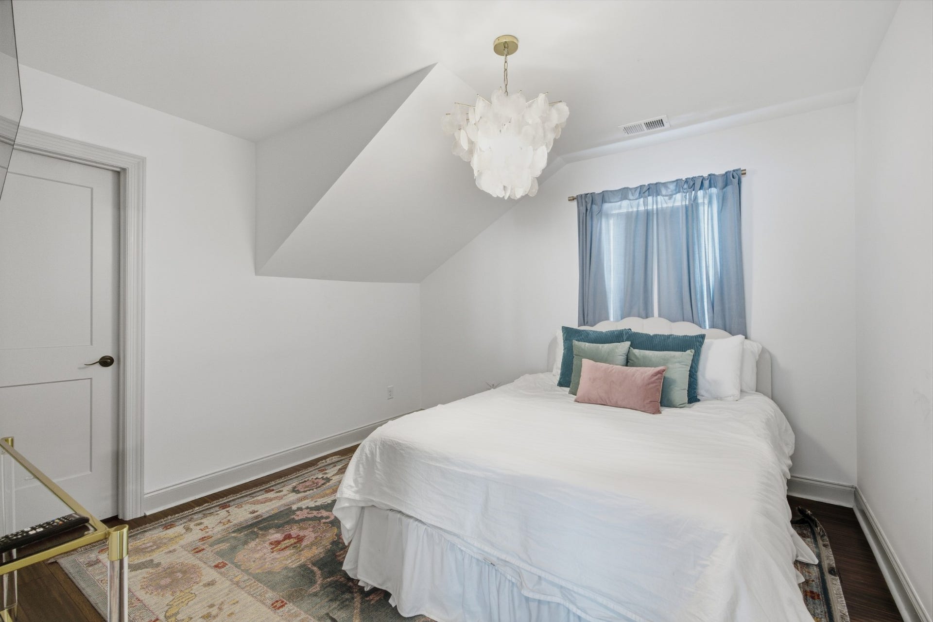 This additional upstairs bedroom is ready to flex as a creative studio, fitness room, or personalized space of your own.