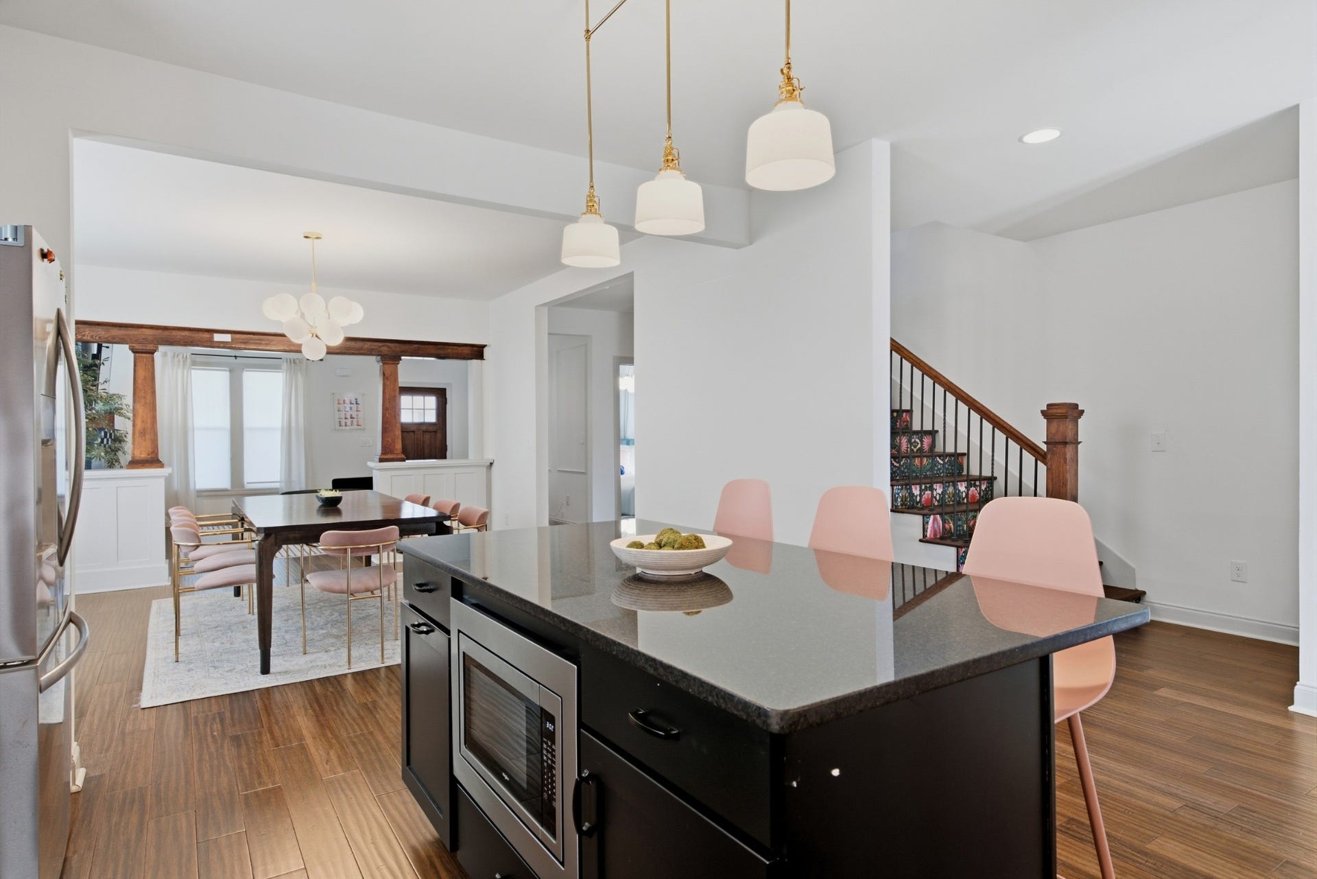 The open-concept layout creates an easy transition between spaces, keeping the main level feeling connected and inviting.