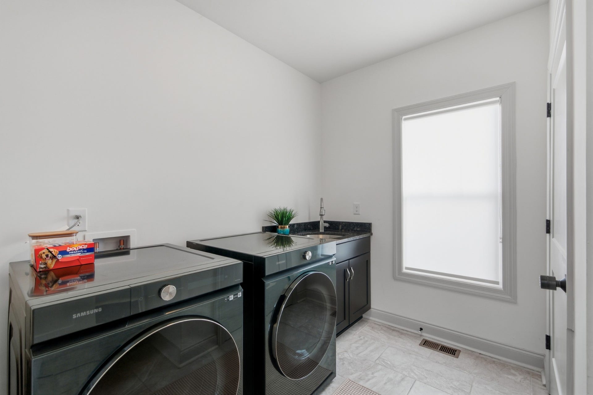 The dedicated utility room makes everyday laundry and household tasks a breeze.