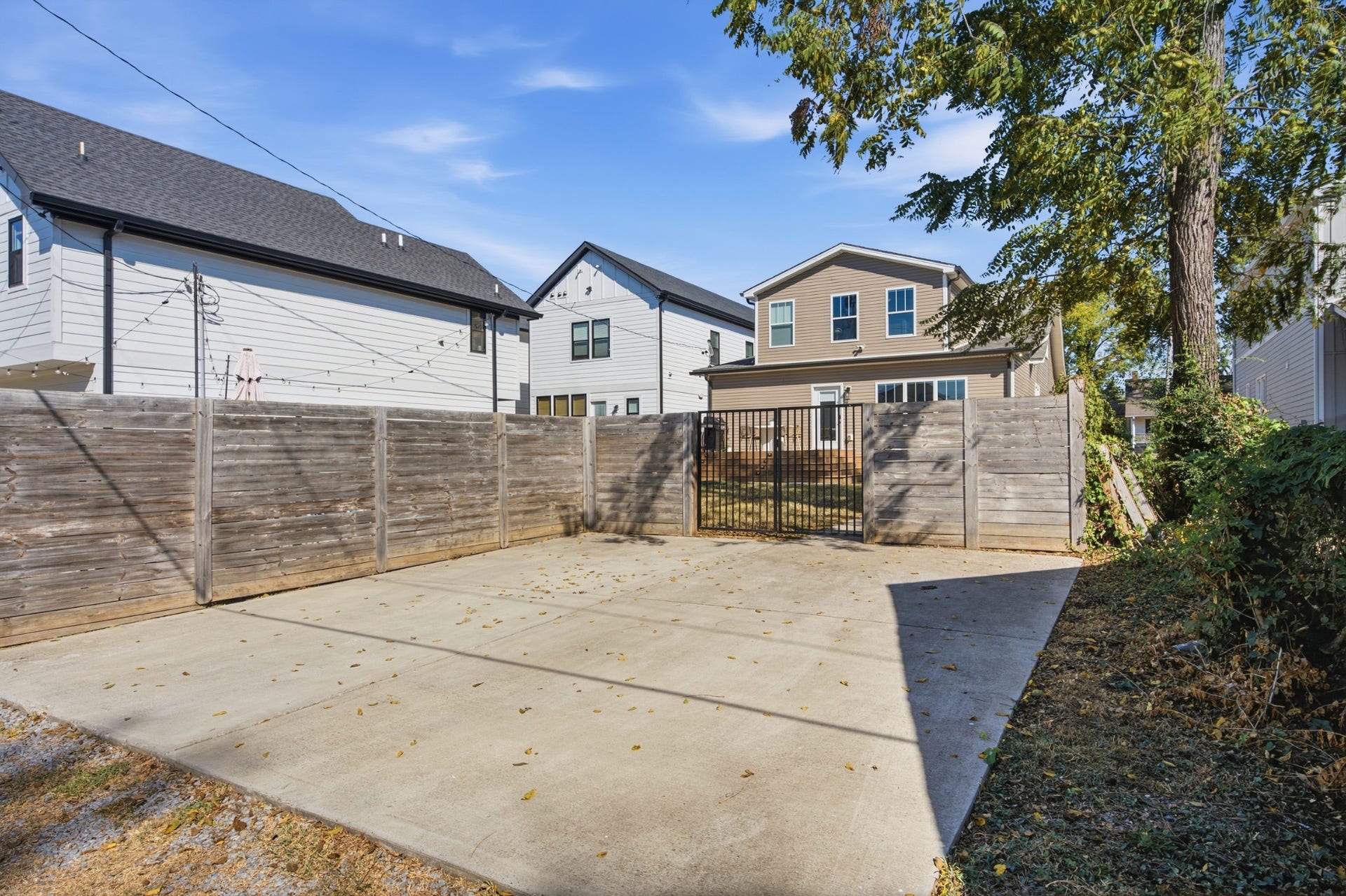 A dedicated parking pad means you can skip the street parking and pull right in at home.