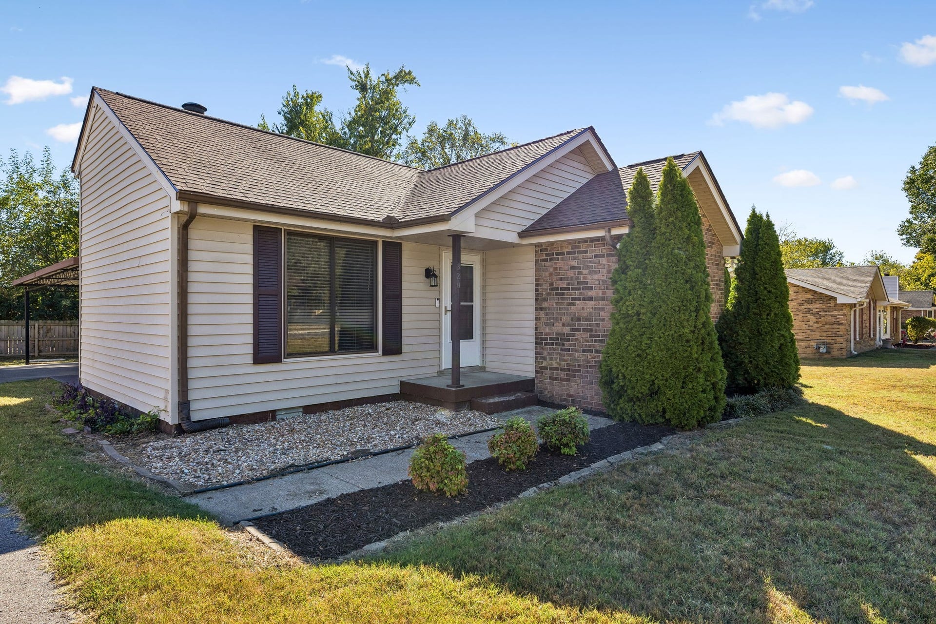 The windows have been replaced and the covered front porch invites family & friends.
