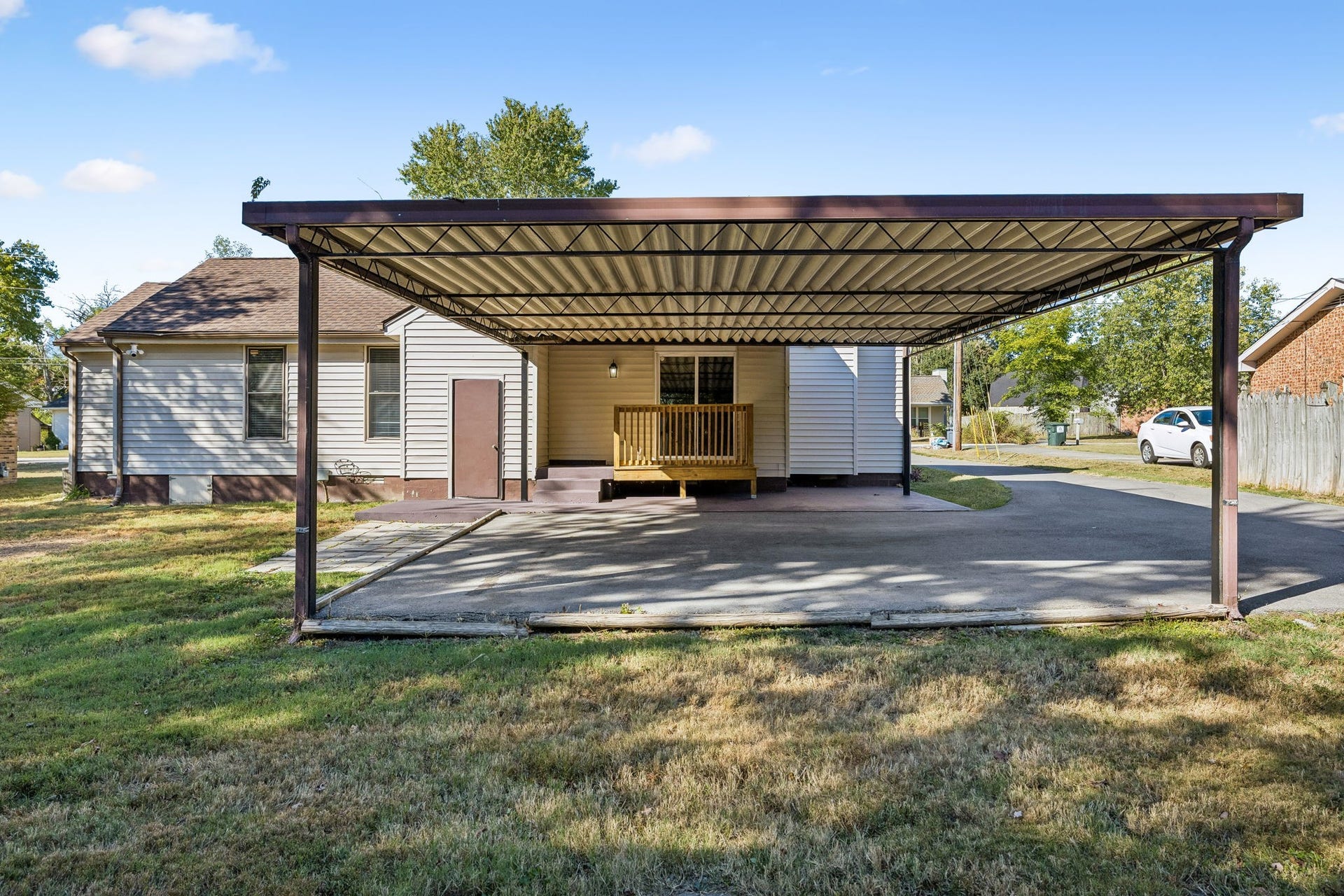 The backyard has tons of space for yard and parking.