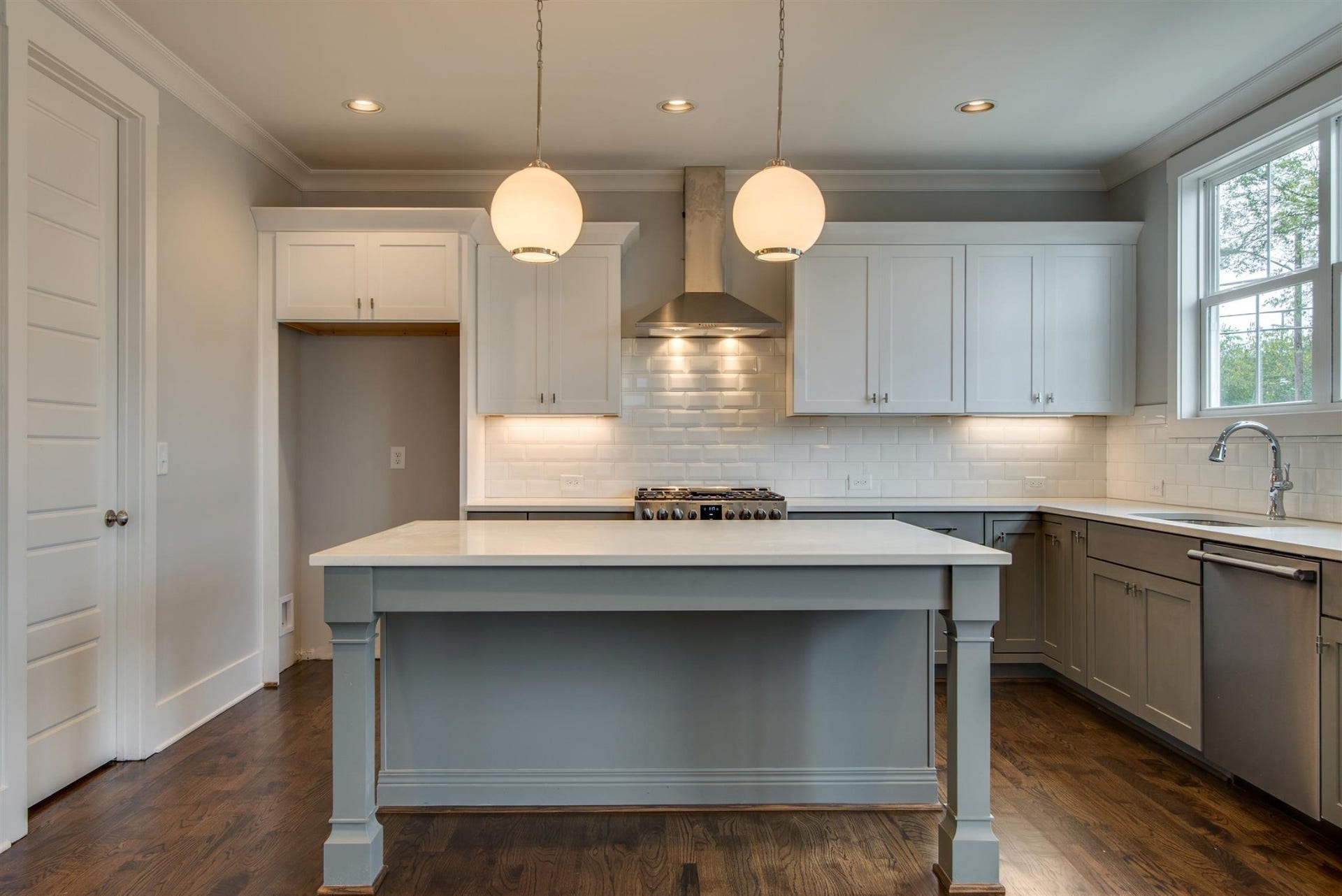 1711 10th Avenue S, Nashville, TN 37203 Refrigerator in black stainless, side by side. Kitchen with extra large pantry,