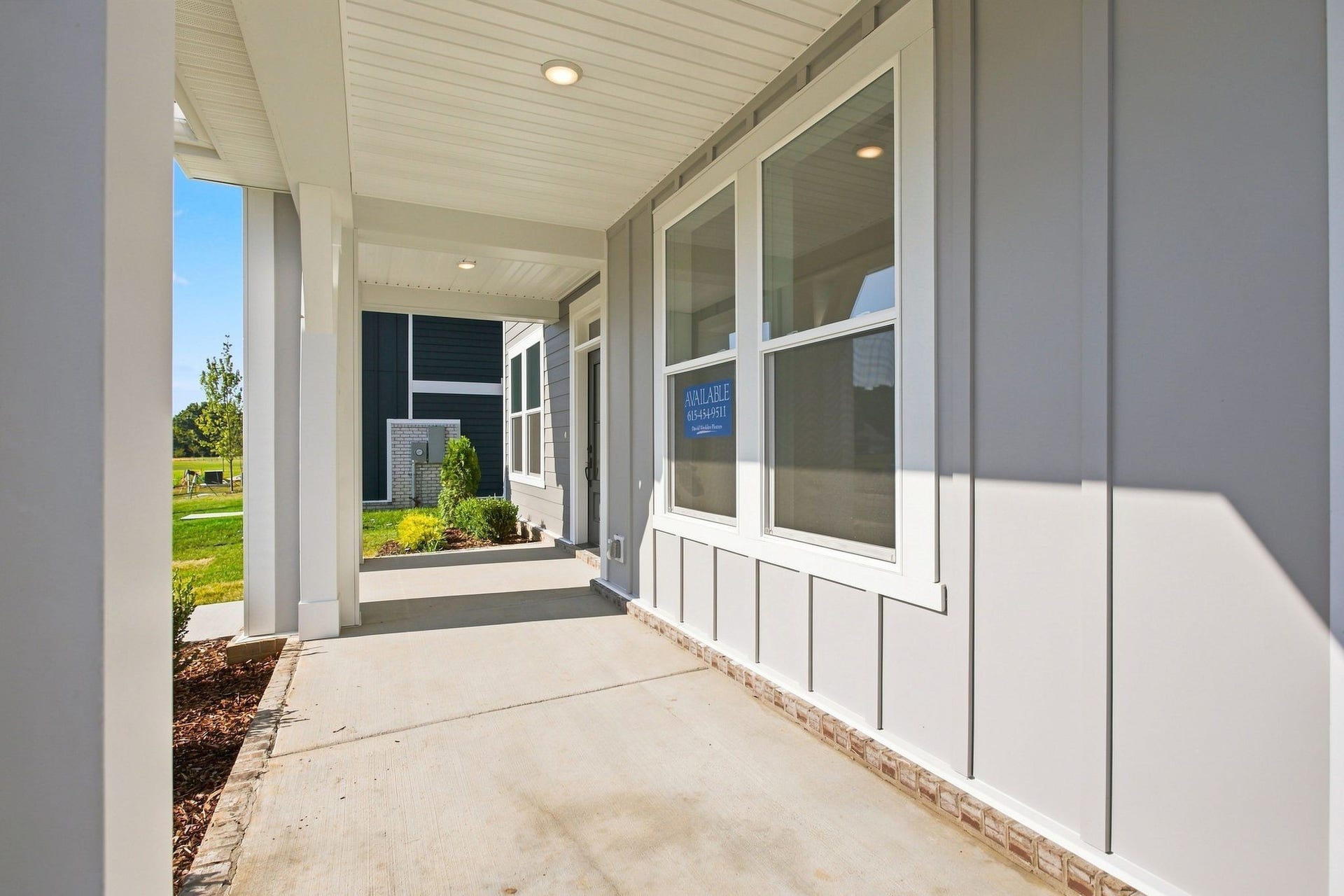 762 Caddy Xing, Columbia, TN 38401 Large front covered porch for coffee, swing, or porch garden