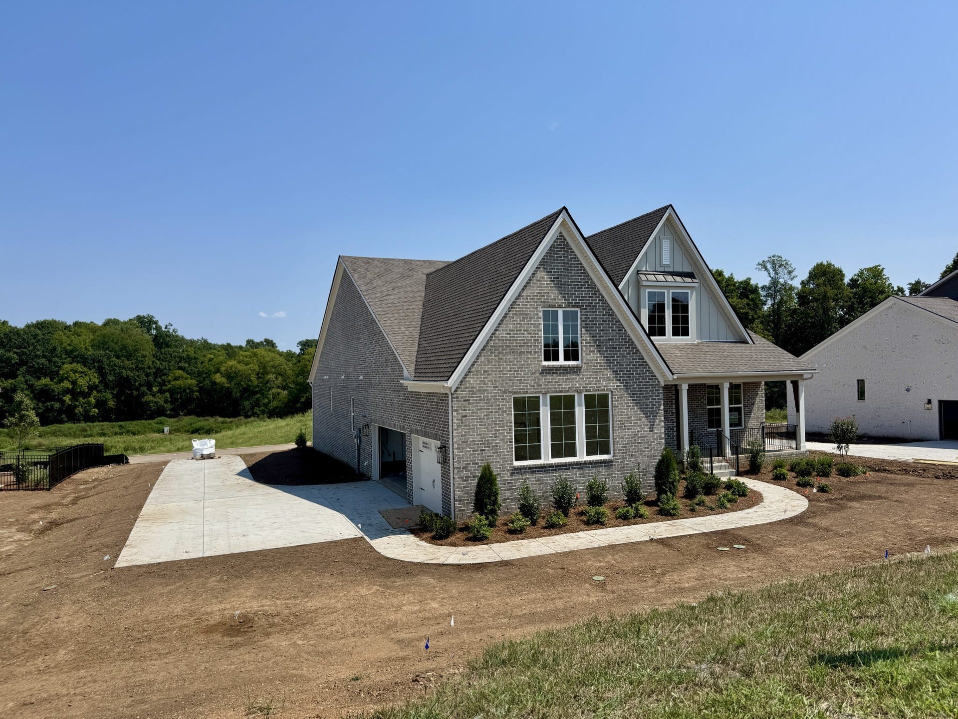 576 Baker Road, Columbia, TN 38401 3 car side entry garages with driveways that lead from the alley -- look how big that driveway is!