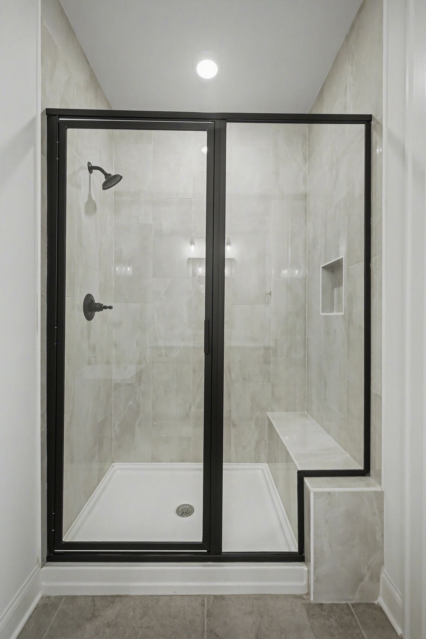 7404 Legends Way, Murfreesboro, TN 37129 Primary bathroom shower w/bench