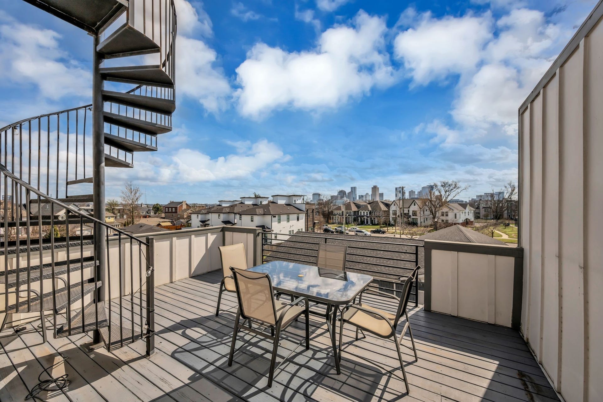 How often will you find not one but TWO rooftop decks with unobstructed downtown views?  Walk up the spiral staircase to get your 360 degree view!