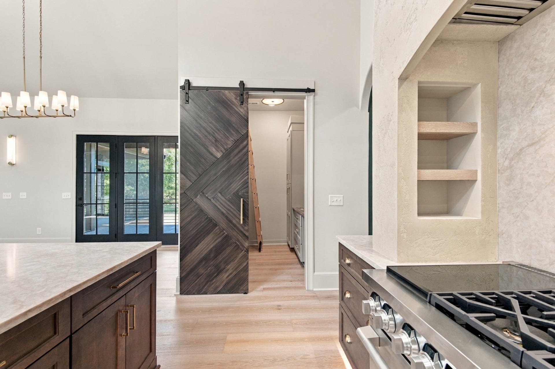 1001 Wright Branch Ct, Mount Juliet, TN 37122 Barn doors don't always have to have a country feel making easy access to your pantry