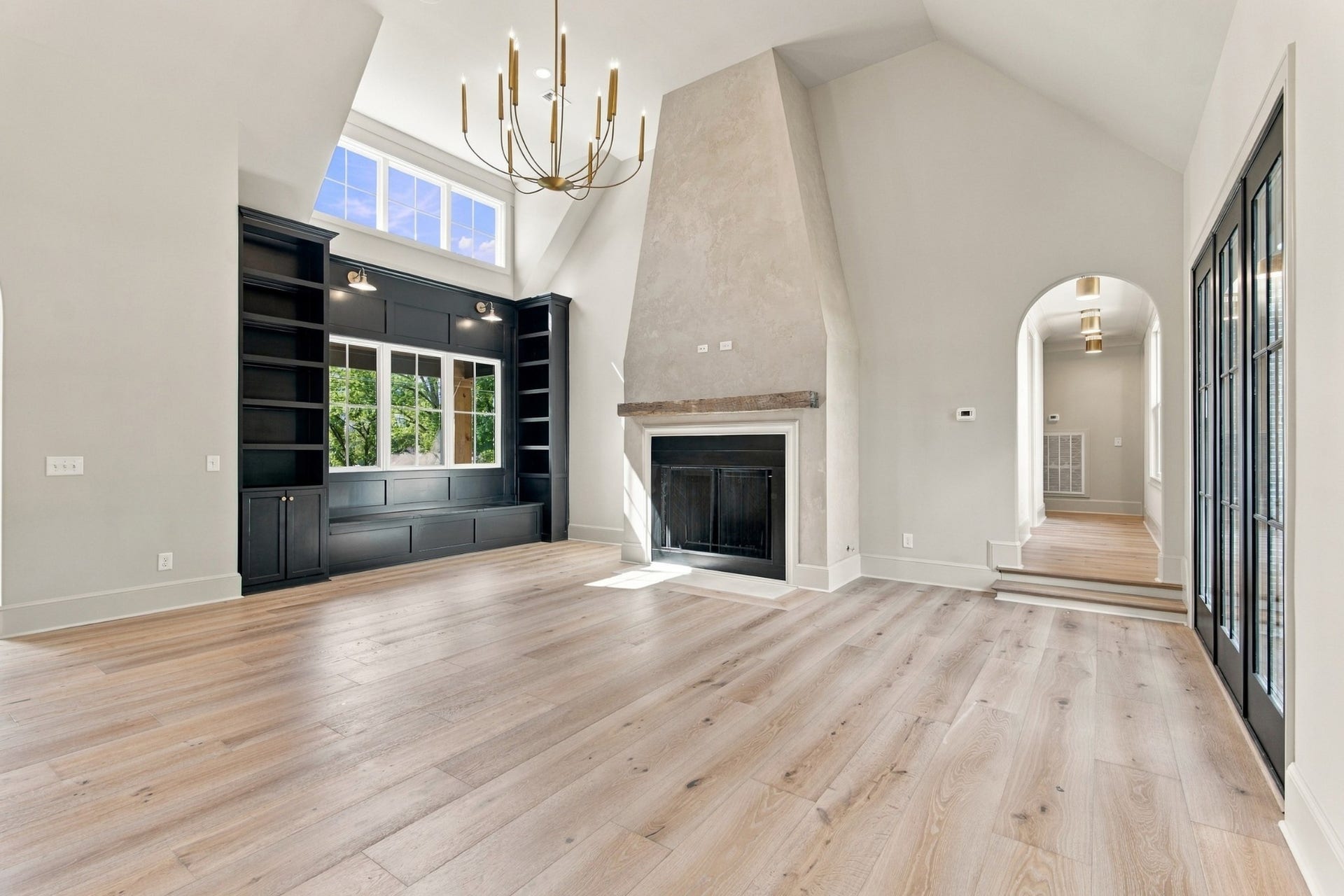 1001 Wright Branch Ct, Mount Juliet, TN 37122 The fireplace is complete with a custom plaster finish that matches the range hood. Real wood burning fireplace to set the mood for the season