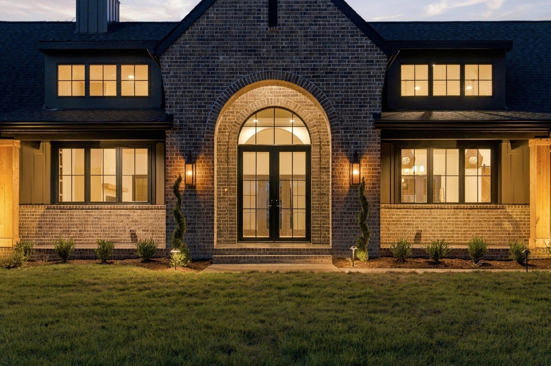 1001 Wright Branch Ct, Mount Juliet, TN 37122 The arched front entry, warm exterior lighting and thoughtful architectural details make a great first impression.