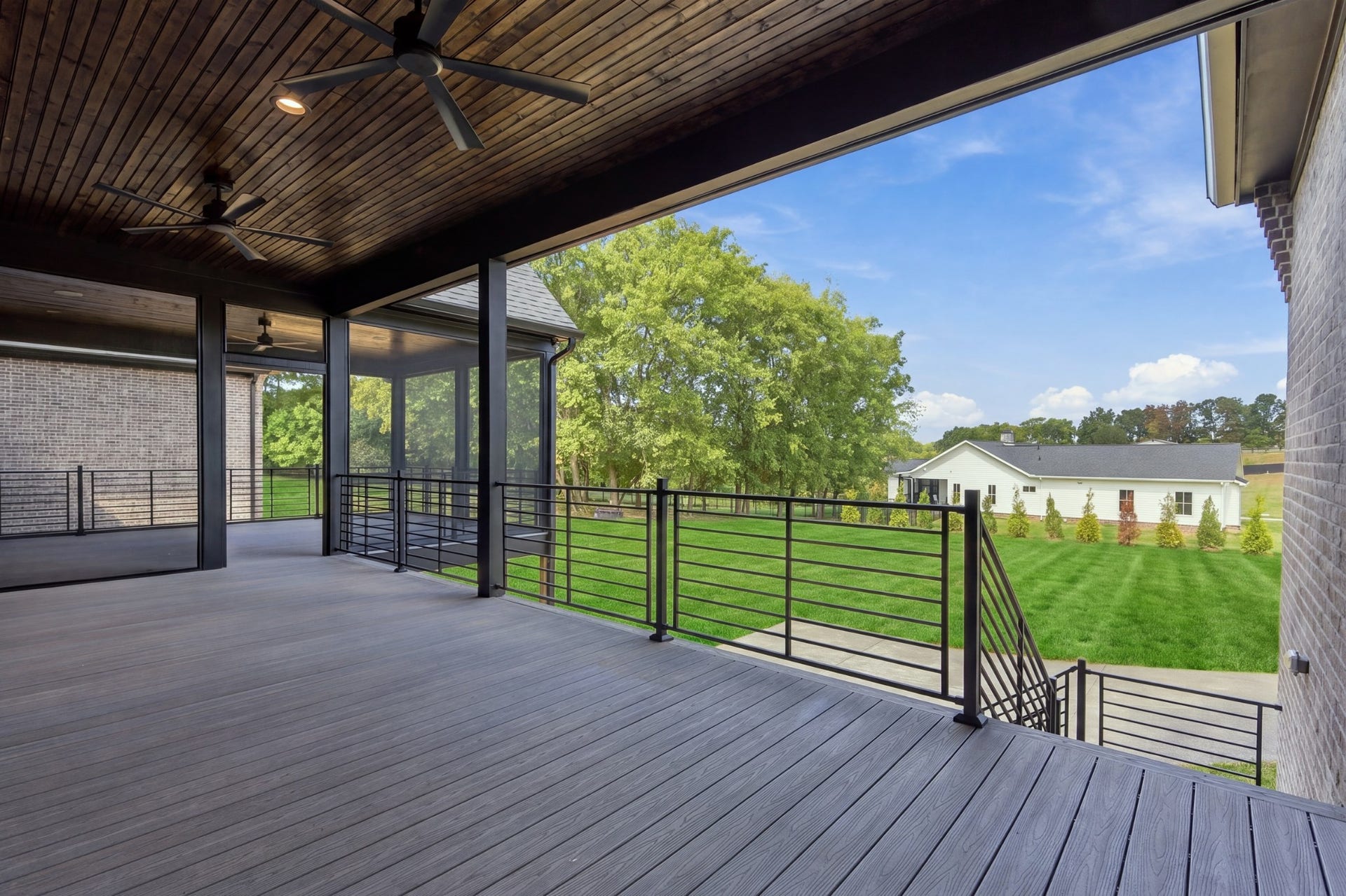1001 Wright Branch Ct, Mount Juliet, TN 37122 Even a portion of the covered deck is open for your entertaing or grilling. The wall to the right already has a plug for your outdoor TV