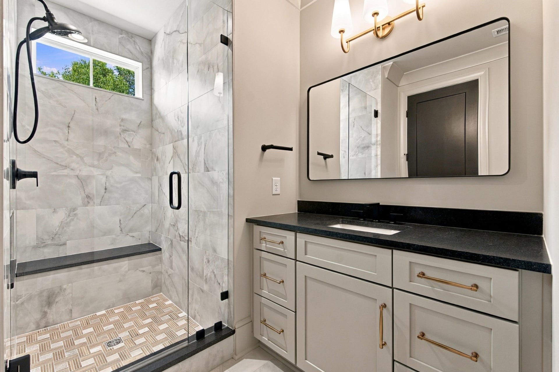 1001 Wright Branch Ct, Mount Juliet, TN 37122 Walk in shower with niche in wall and bench. Plenty of counter space and storage. You will love the tile in this shower