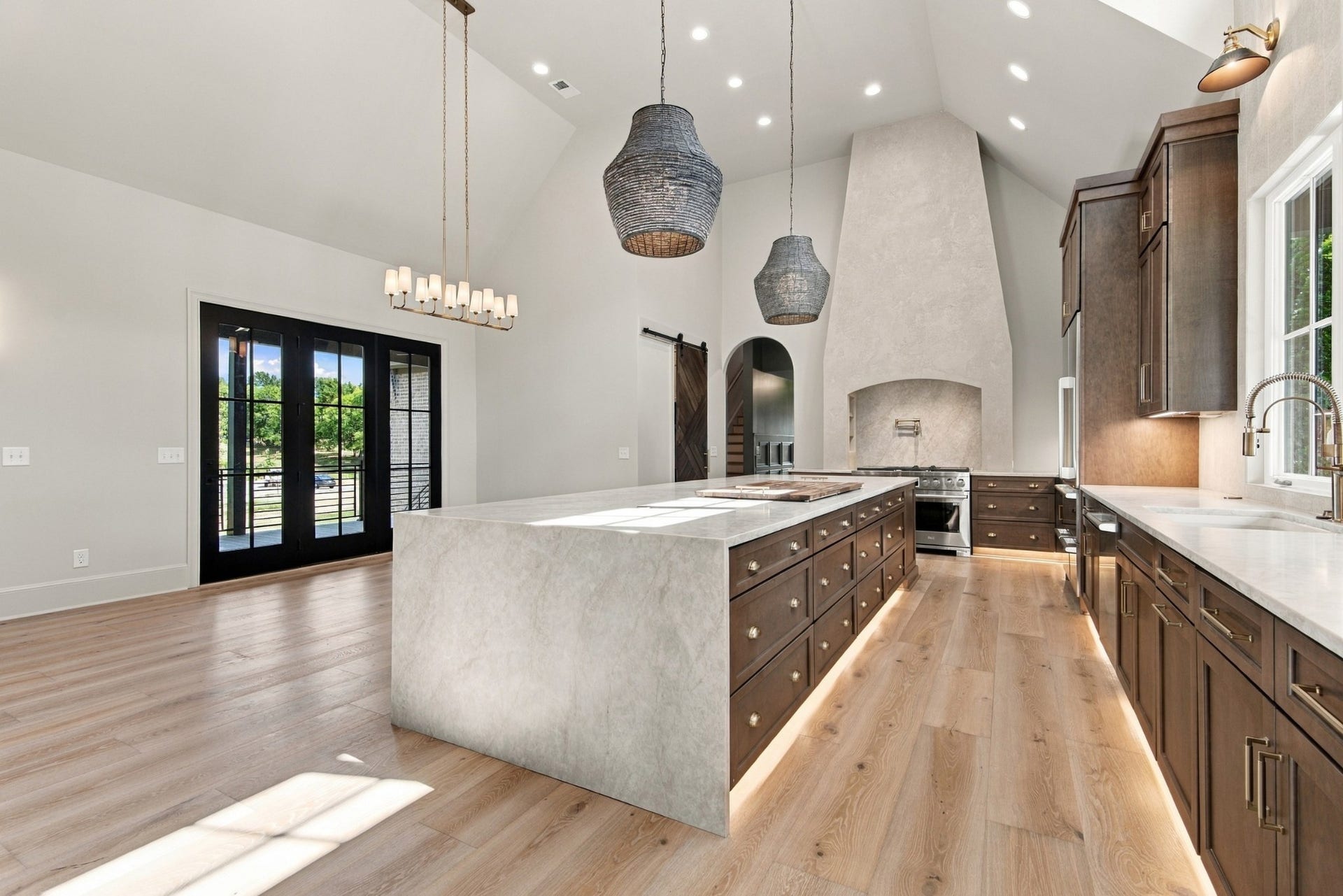 1001 Wright Branch Ct, Mount Juliet, TN 37122 The kitchen is designed to be both beautiful and functional with custom cabinetry, quartz countertops and a large center island.